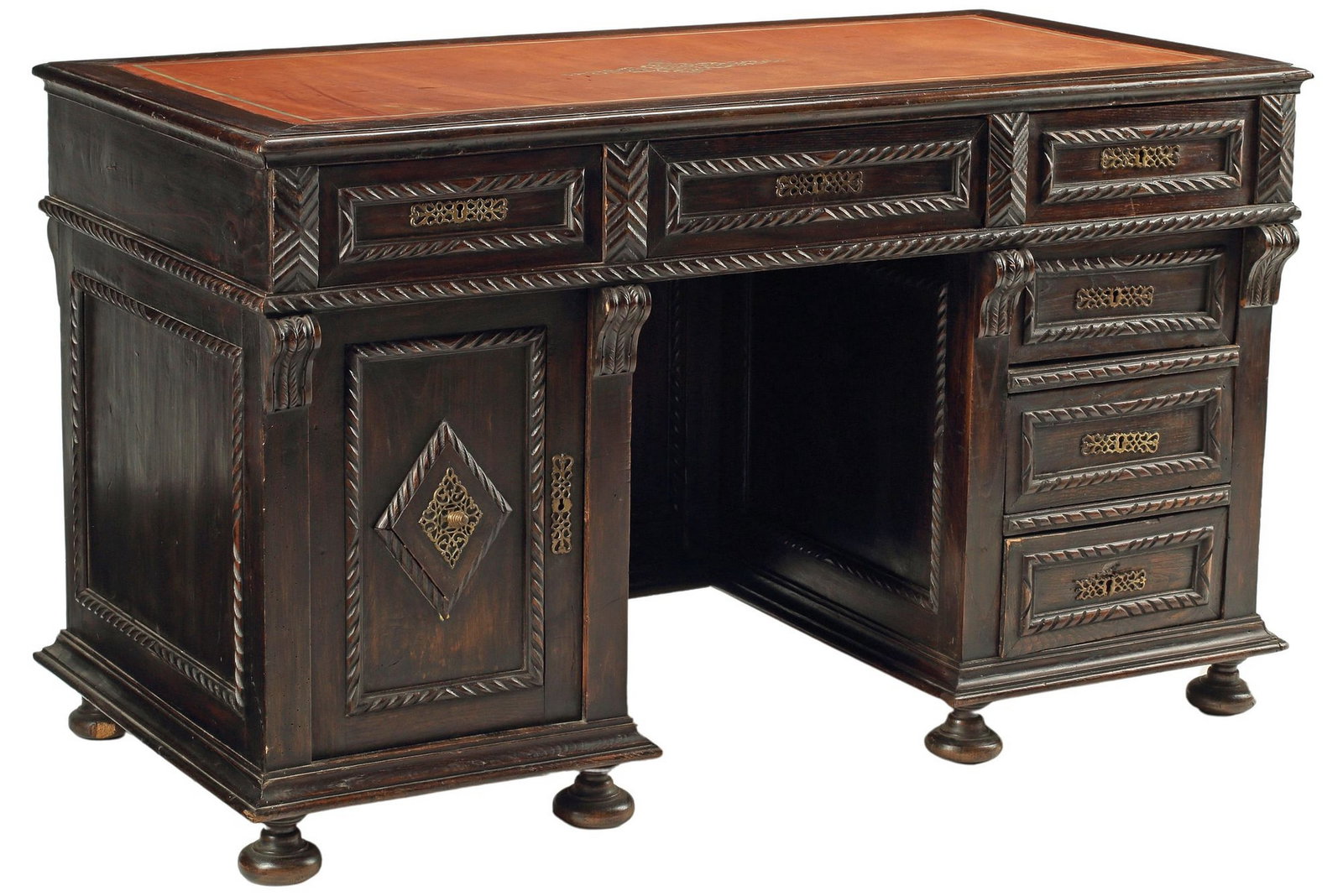 PORTUGUESE WRITING DESK: Portuguese writing desk, 19th c., having leather-inset top, over six drawers and one shelved cabinet door, each with carved gadrooned trim, and pierced metal escutcheon, rising on bun feet, appro