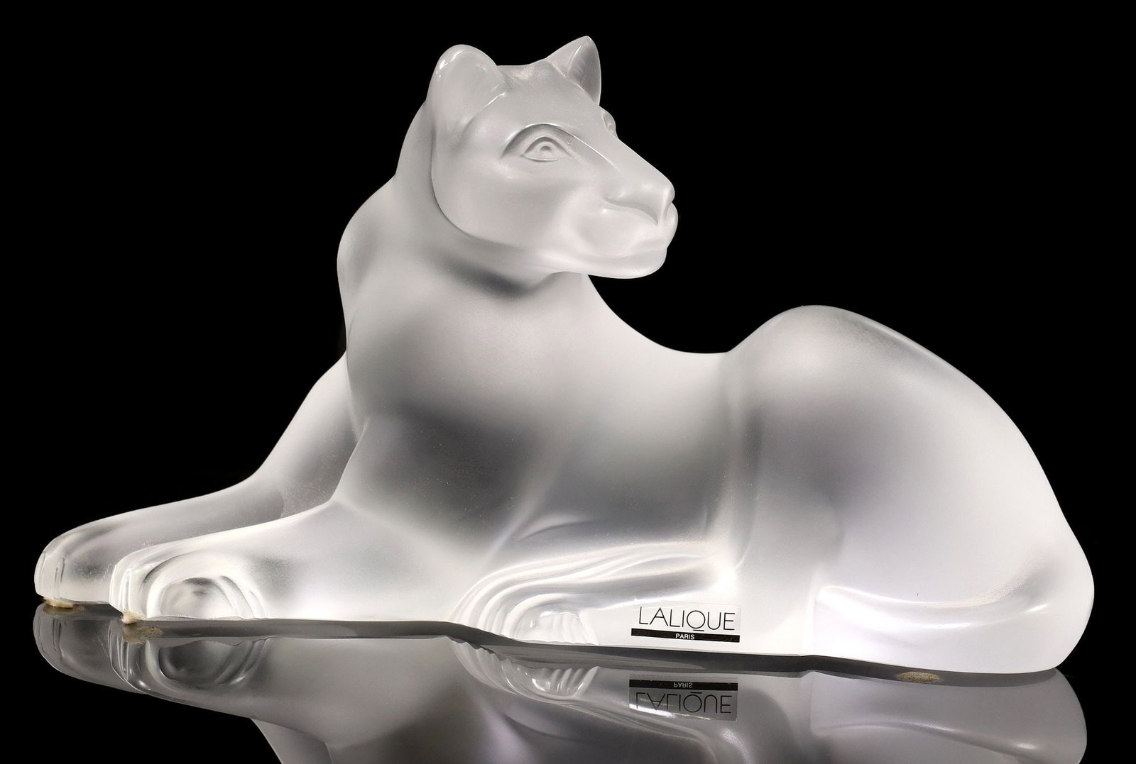 FRENCH LALIQUE 'SIMBA' CLEAR & FROSTED GLASS LIONESS FIGURE: French Lalique clear and frosted glass sculpture, "Simba," depicting a resting lioness, engraved signature Lalique France, housed in branded box, figure: approx 5.5"h, 9.75"w, 4.25"d, box: approx7"h, 