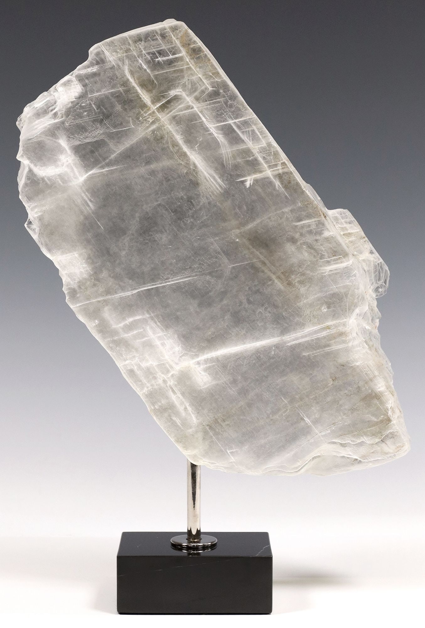 GEOLOGICAL WINDOWPANE SELENITE SLICE ON BLACK MARBLE BASE (1 of 3)