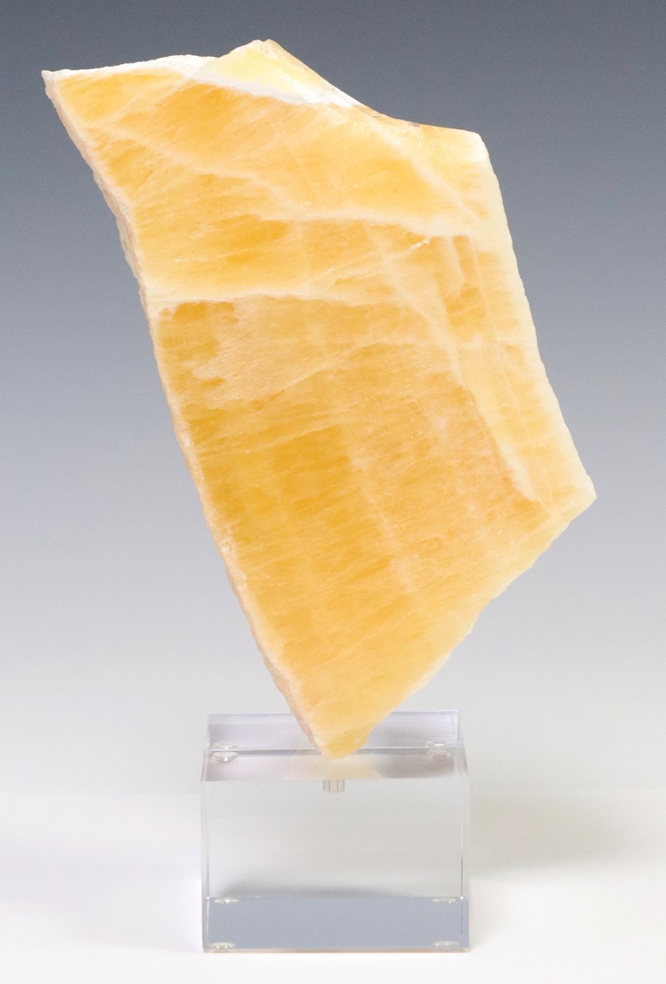 GEOLOGICAL HONEYCOMB CALCITE SLICE ON COLORLESS ACRYLIC BASE (1 of 3)