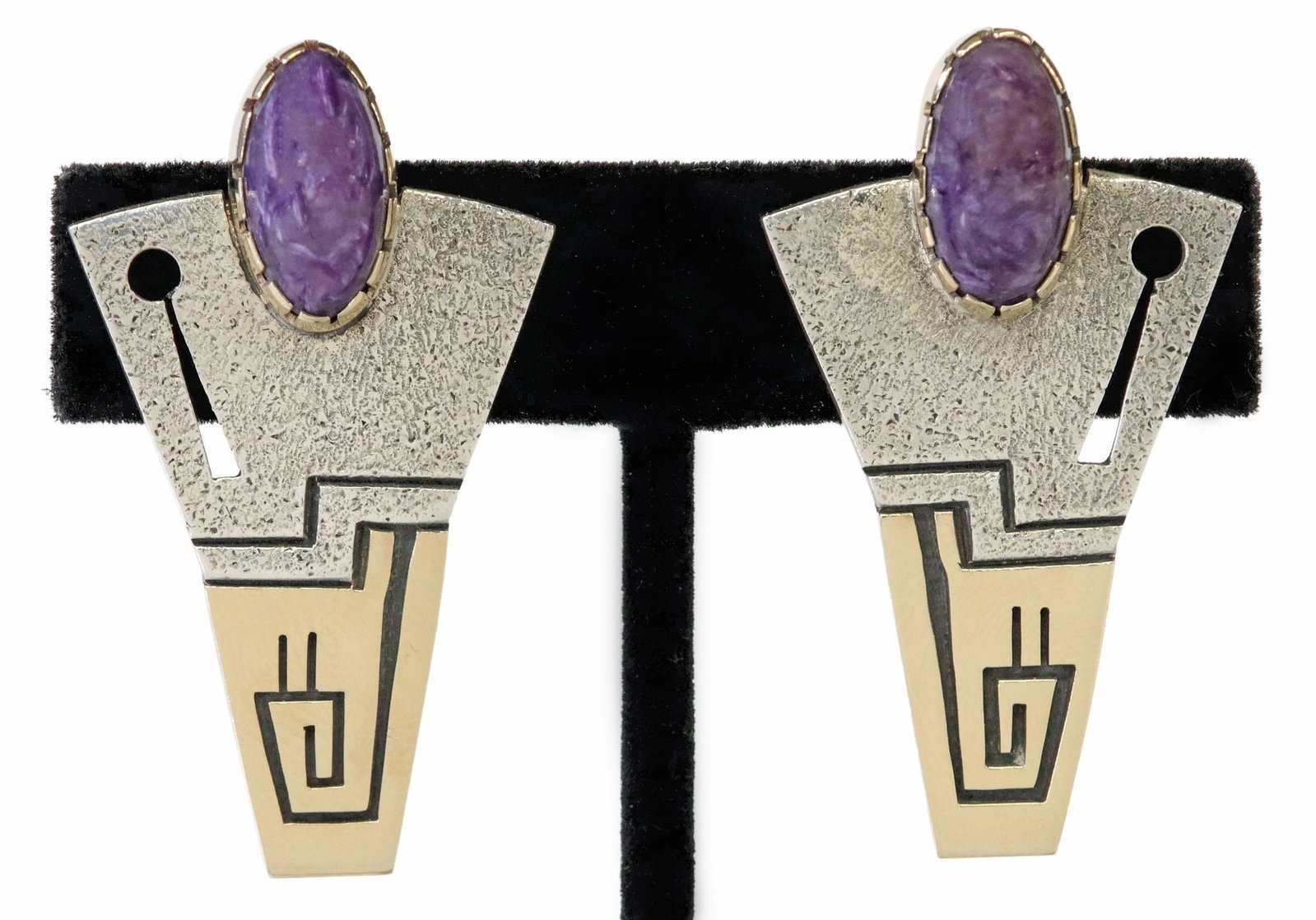 (PAIR) PHILBERT POSEYESVA (B.1960) HOPI 14K YG OVERLAY, STERLING & CHAROITE EARRINGS: (pair) Native American 14kt yellow gold overlay and sterling silver clip-back earrings, stamped PP (Philbert Poseyesva, Hopi, b.1960), central bezel-set charoite cabochon, on tapered triangular b