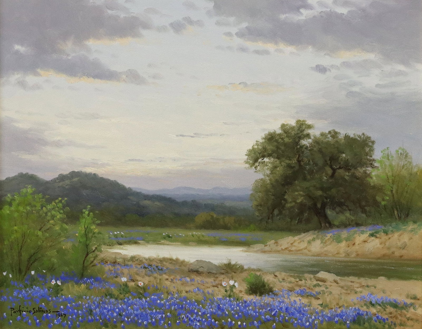 PORFIRIO SALINAS (1910-1973) TEXAS LANDSCAPE BLUEBONNETS, 16" X 20": Framed oil on canvas painting, River Landscape with Bluebonnets, signed lower left Porfirio Salinas (Texas, 1910-1973), dated 1967, G. Harvey Gallery framing label verso, sight: approx 15.75"h, 19.75"