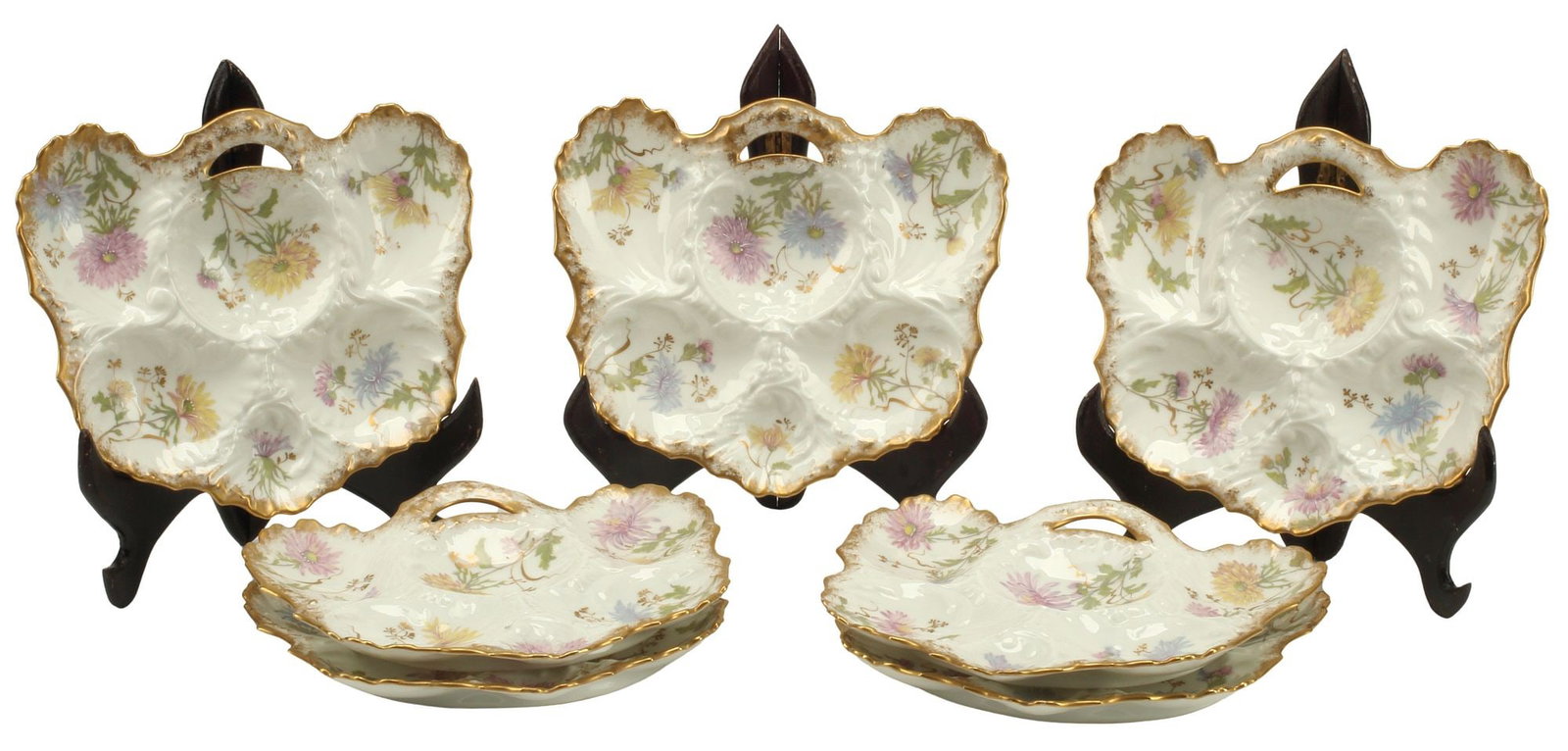 (12) FRENCH REDON LIMOGES PARCEL GILT PORCELAIN OYSTER PLATES: (lot of 12) French Limoges parcel gilt porcelain oyster plates, Redon, each having scalloped border and shaped wells, maker's mark underfoot, approx 1.5"h, 7.5"w, 9"d, 8.25lbs total
