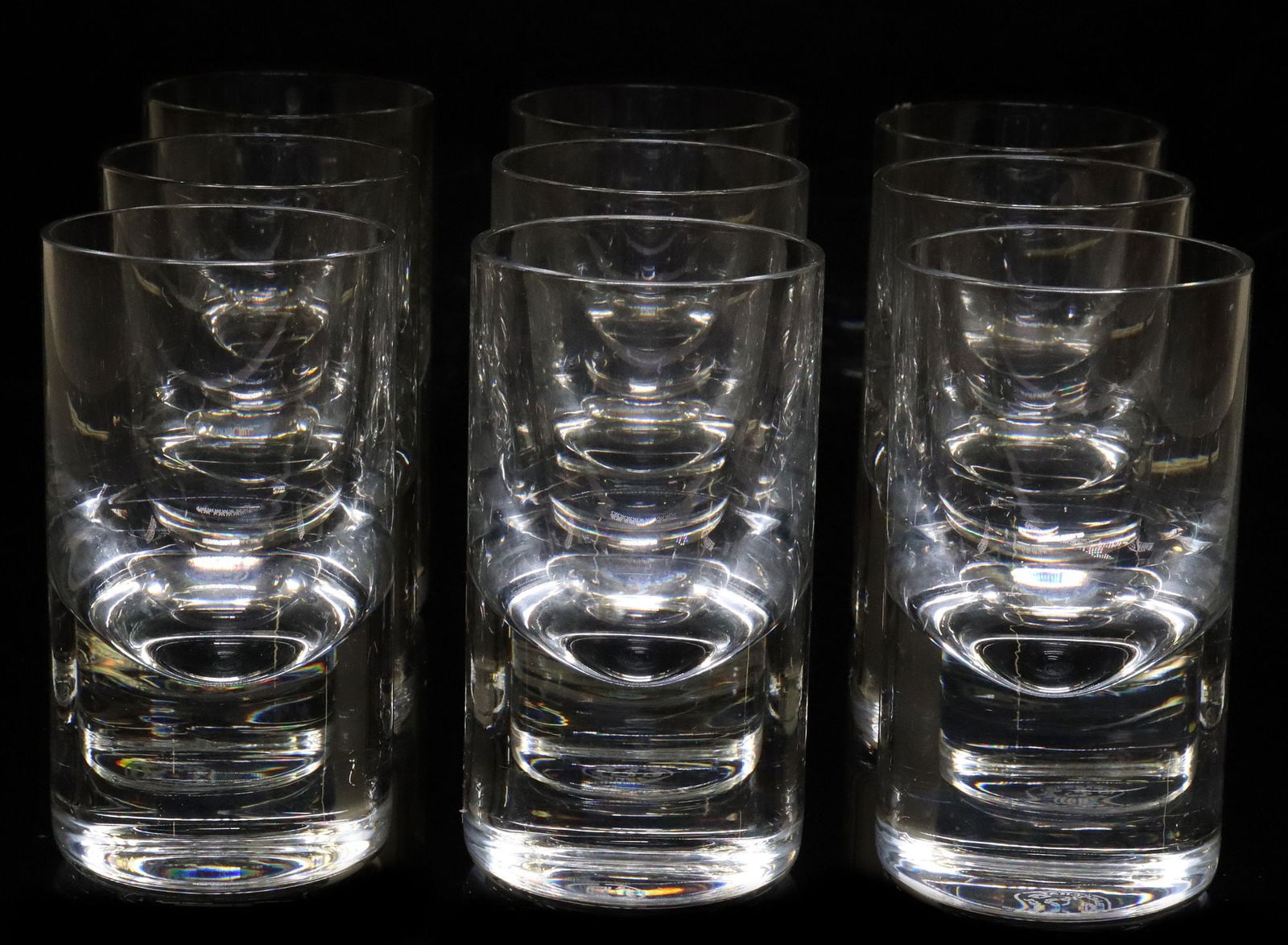 (9) ROBERTO SAMBONET (1924-1995) FOR BACCARAT TIR BAR GLASSES: (lot of 9) French crystal tumblers/ glasses, TIR Bar model, Roberto Sambonet (Italian, 1924-1995) for Baccarat, solid glass base, approx 4 3/8"h, 2 3/8"diam; 11.25lbs total