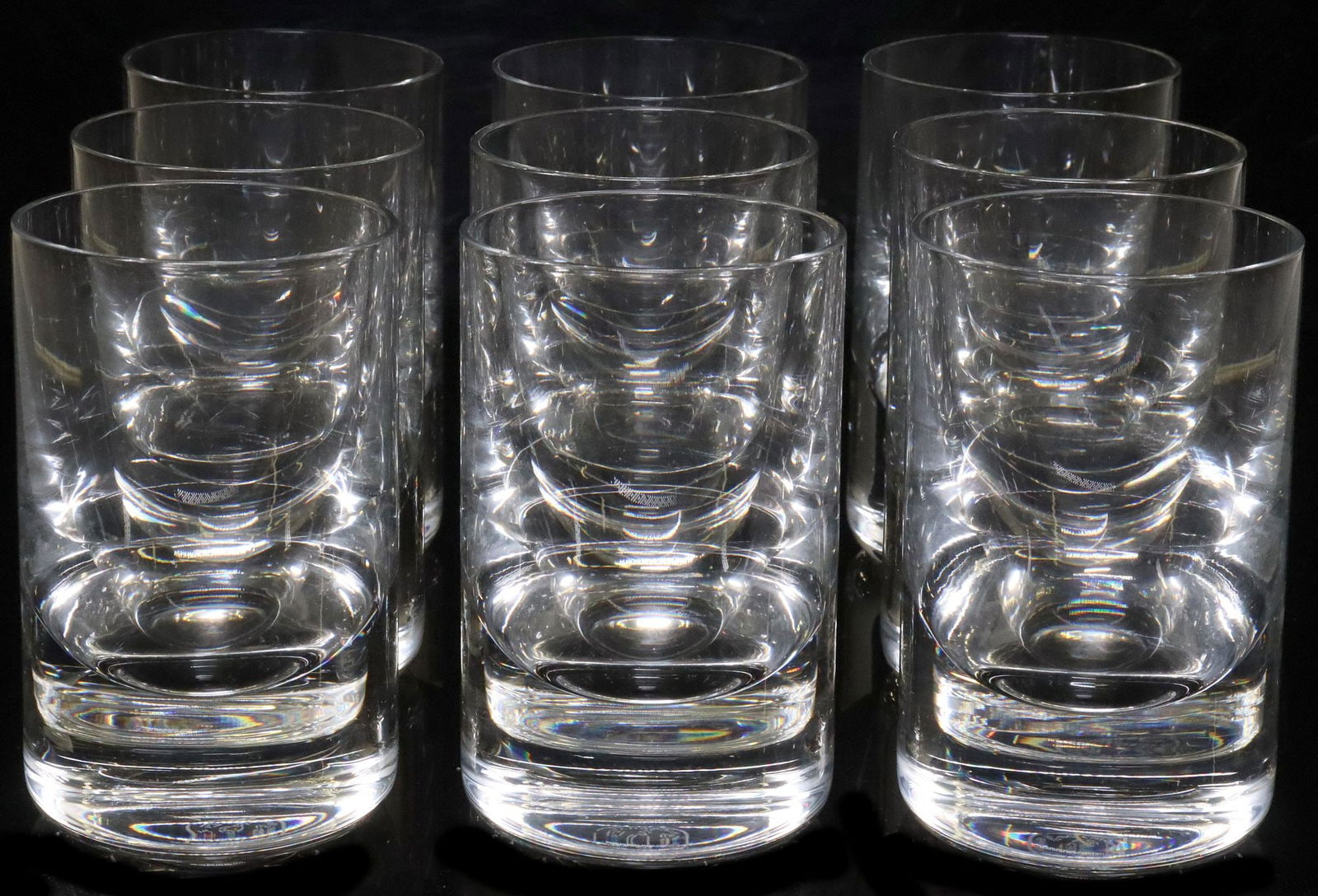 (9) ROBERTO SAMBONET (1924-1995) FOR BACCARAT TIR BAR GLASSES: (lot of 9) French crystal tumblers/ glasses, TIR Bar model, Roberto Sambonet (Italian, 1924-1995) for Baccarat, solid glass base, approx 4 3/8"h, 2.75"diam; 12.75lbs total