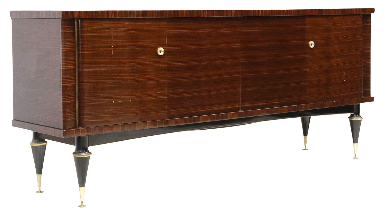 FRENCH MID-CENTURY MODERN LACQUERED MACASSAR EBONY SIDEBOARD: French mid-century modern lacquered sideboard, in the manner of Jacques Adnet (French, 1900–1984), c.1960s, likely macassar ebony veneer, rectangular case fitted with two sets of dual&