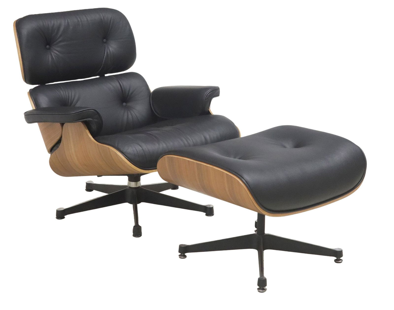 (2) EAMES STYLE BLACK LEATHER LOUNGE CHAIR & OTTOMAN: (lot of 2) Mid-century modern style lounge chair and ottoman, in the manner of Charles Eames (American, 1907-1978) and Ray Eames (American, 1912-1988), 20th c., each in button-tufted black leathe