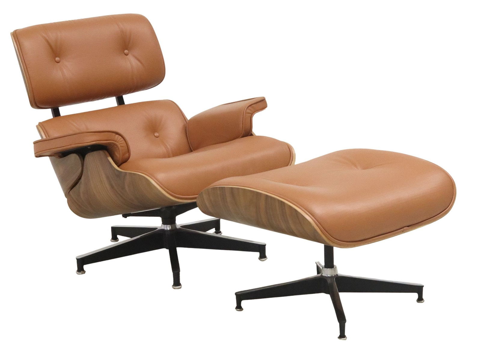 (2) EAMES STYLE TAN LEATHER LOUNGE CHAIR & OTTOMAN: (pair) Mid-century modern style lounge chair and ottoman, in the manner of Charles Eames (American, 1907-1978) and Ray Eames (American, 1912-1988), 20th c., each in button-tufted tan leather upholster