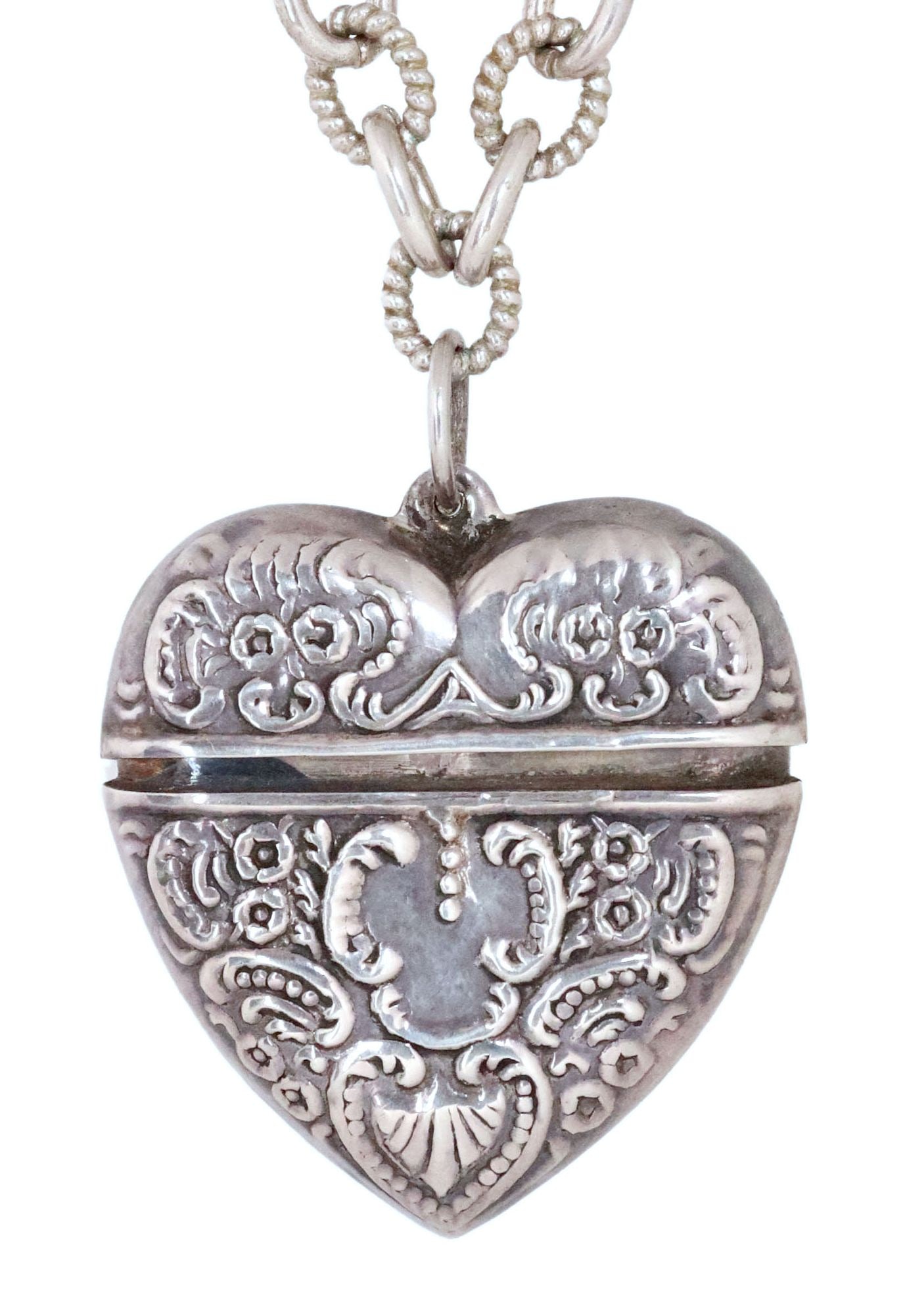 DESIGNER JUDITH RIPKA STERLING SILVER NECKLACE, HUNG WITH PUFFY HEART LOCKET: Designer sterling silver necklace, Judith Ripka oval link chain necklace, padlock clasp set with cubic zirconia (CZ), hung with an added puffy heart locket, locket marked Thailand/ 925