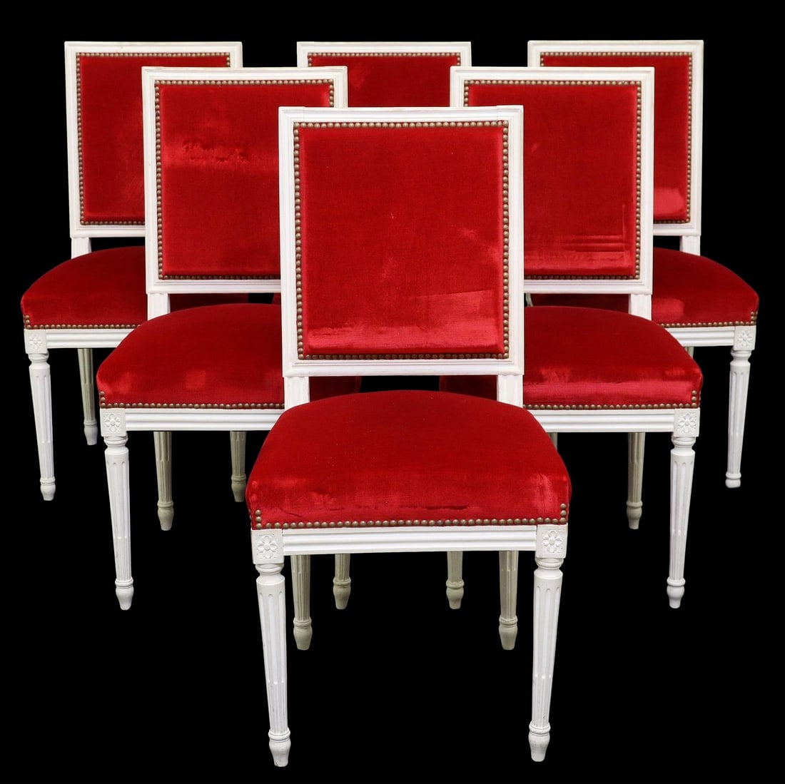 (6) FRENCH LOUIS XVI STYLE PAINTED DINING CHAIRS: (lot of 6) French Louis XVI style side chairs, 20th c., white painted frame with nail-head accented red upholstery, rising on ribbed supports, one with light marker remnant to back top rail, approx 36