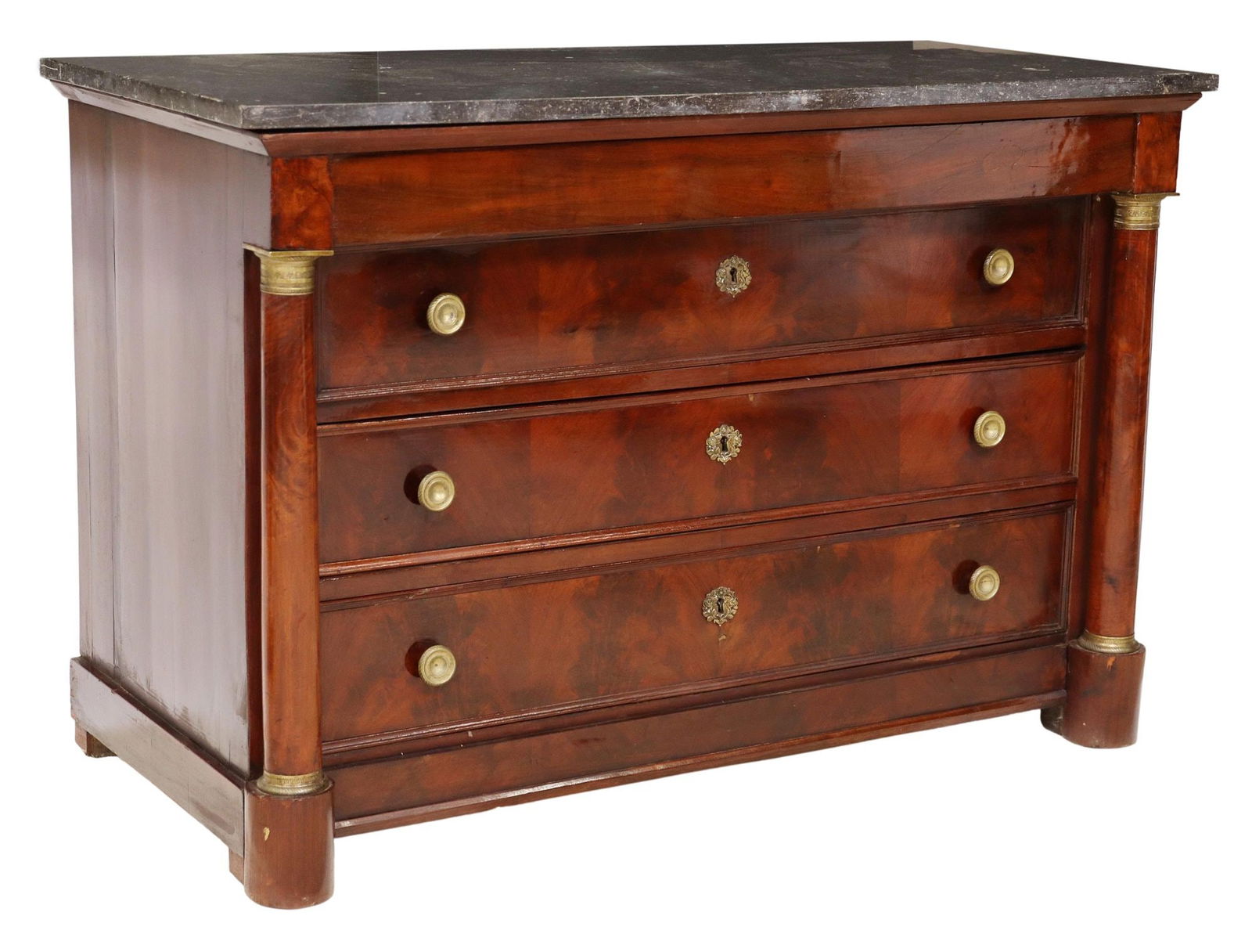 FRENCH EMPIRE STYLE MARBLE-TOP MAHOGANY COMMODE: French Empire style mahogany commode, 19th c., having marble top, frieze drawer, over three drawers, flanked by turned columnar supports, marble top intact with professional restoration, approx 36.75&