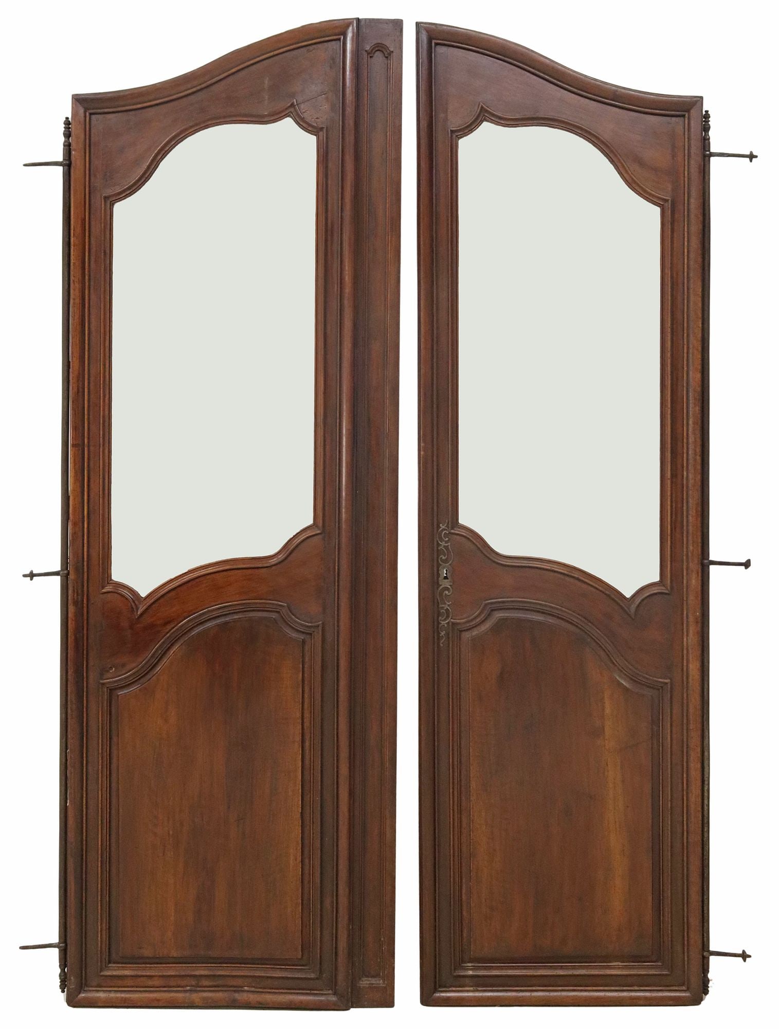 (2) FRENCH LOUIS XV STYLE CARVED WALNUT ARCHITECTURAL DOORS, 88.5"H: (pair) French Louis XV style walnut armoire doors, 19th c., glazed doors with carved trim, mounted with scrolled iron escutcheon, with long exterior hinges, each approx 88.5"h, 26.5"w, 