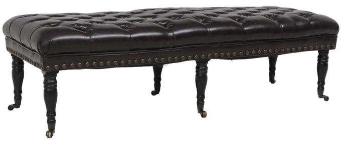 LARGE BUTTON-TUFTED BLACK LEATHER BENCH ON CASTORS