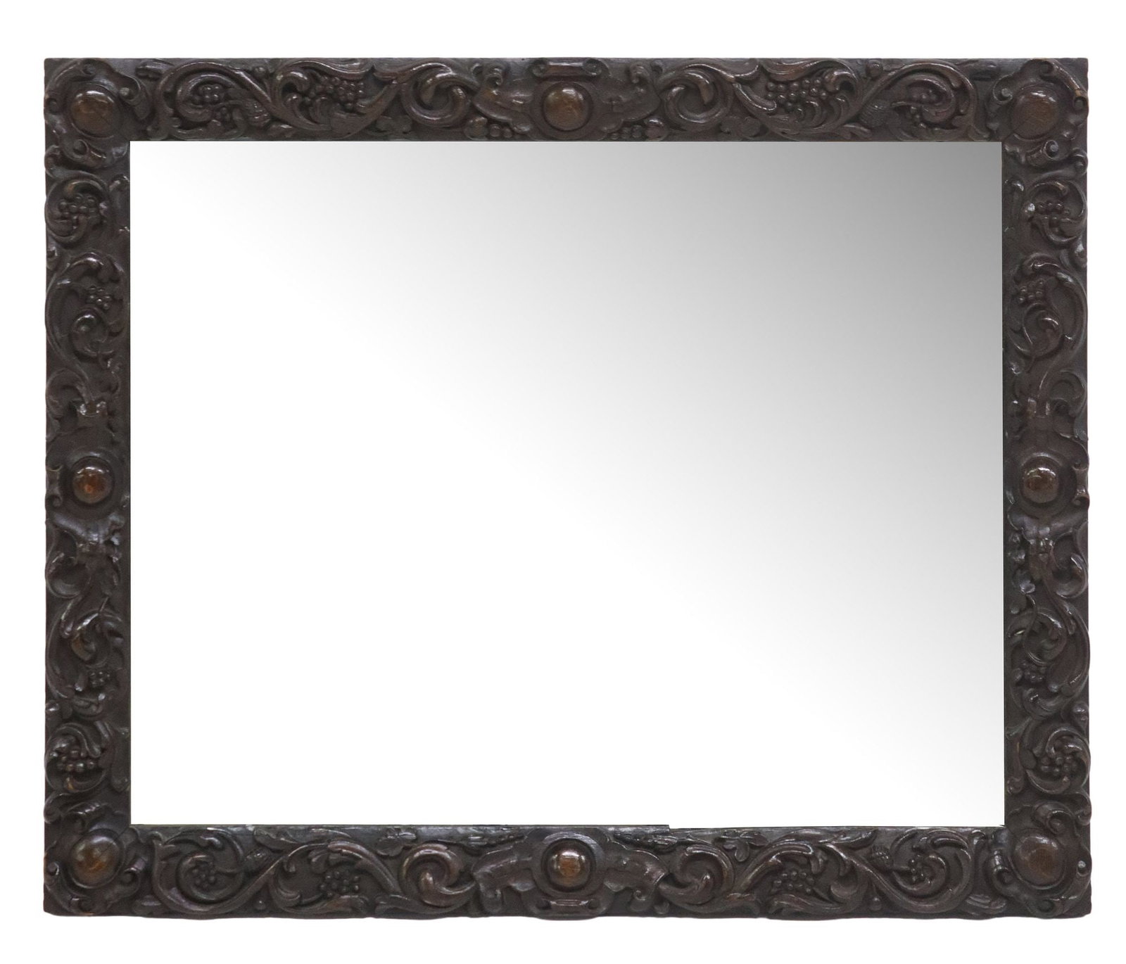 BLACK FOREST STYLE CARVED OAK PICTURE FRAME MIRROR: Black Forest style carved oak wall mirror, early 20th c., rectangular frame with shields, scrolled foliates, and grape cluster motifs, encasing flat mirror plates, approx 28"h, 34"w, 26lbs