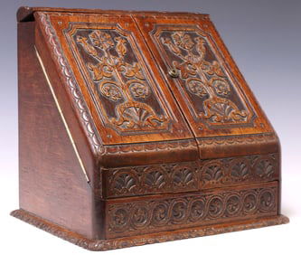 FINE VICTORIAN PERIOD CARVED OAK SLANT-FRONT WRITING COMPENDIUM