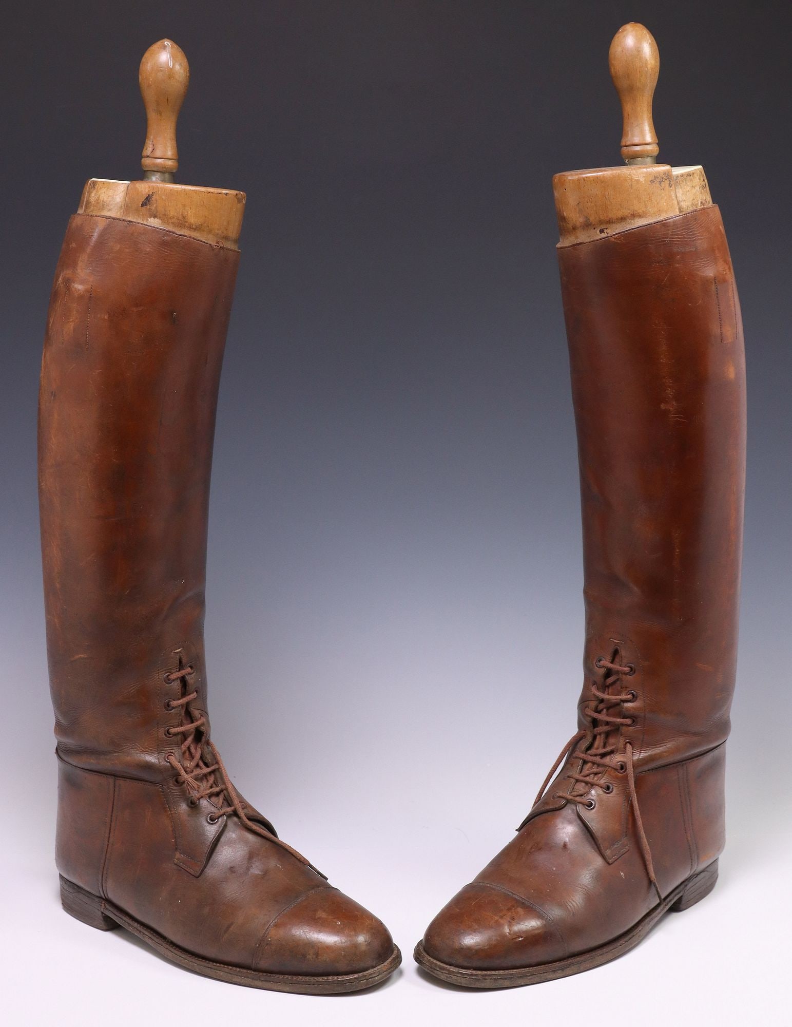 (PAIR) ENGLISH BROWN LEATHER RIDING BOOTS WITH TREES: (pair) English brown leather riding boots, with boot tree/ shaper, shapers marked "J.H.R. Shaw, Peal & Co., London, Patent No. 35562," boot: approx 20"h, 12.5"w, 4.5"
