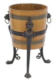 ENGLISH OAK BARREL-FORM PLANTER ON FIGURAL IRON STAND
