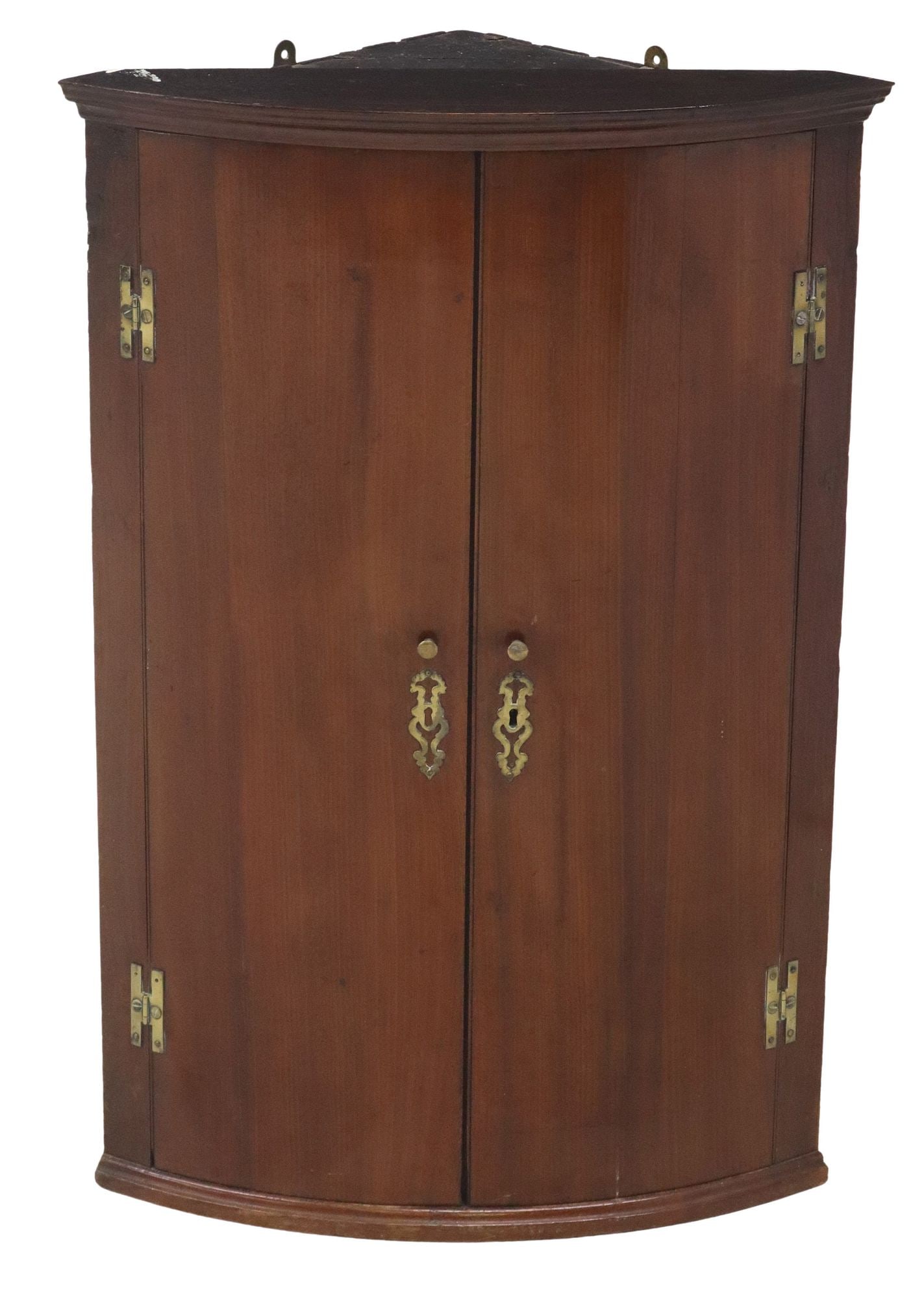 ENGLISH GEORGE III MAHOGANY HANGING BOWFRONT CORNER CUPBOARD: English George III mahogany bowfront corner cupboard, late 18th c., two doors on brass h-shaped hinges, interior shelves, approx 38.75"h, 26.25"w, 17.5"d