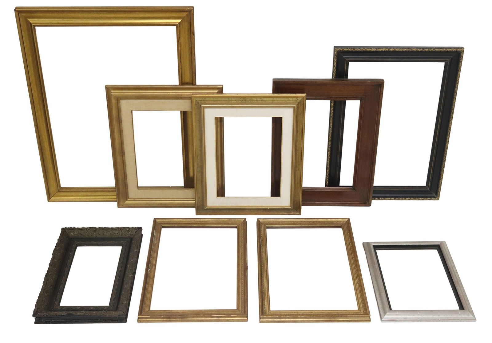 (9) COLLECTION OF CONTINENTAL RECTANGULAR PICTURE FRAMES: (lot of 9) Continental rectangular picture frames, various styles and materials, including: (3) giltwood frames, (2) gilt painted, (2) in an ebonized finish, (1) natural wood frame, (1) in a silv