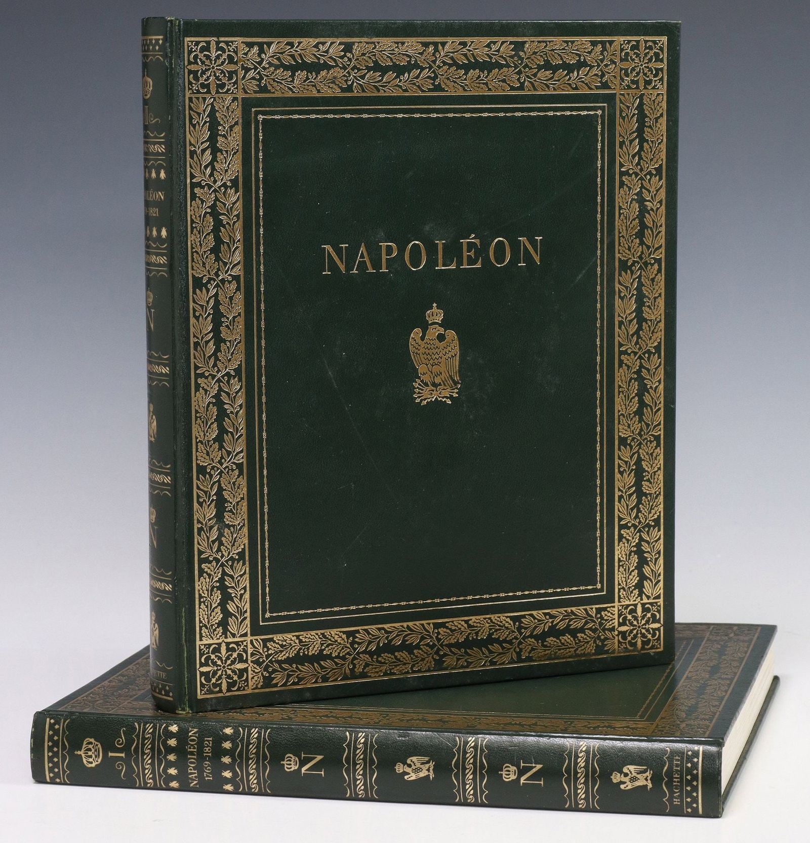 (2) BOOKS: 'NAPOLEON ET L'EMPIRE: 1769-1821' LIBRAIRIE HACHETTE 1968: (2 volumes) Books: "Napoleon et l'Empire: 1769 - 1815 - 1821," edited by Jean Mistler, Librairie Hachette, 1968, gilt-decorated spine and boards, with frame of laurel and oak b