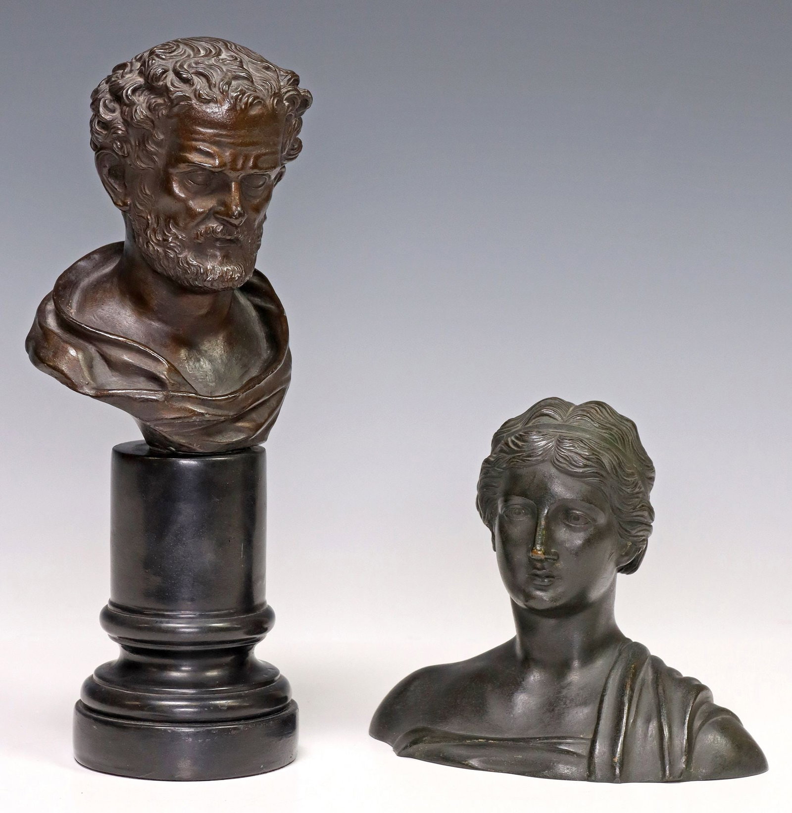 (2) GRAND TOUR STYLE PATINATED BRONZE BUSTS, ARTEMIS & HERACLITUS: (lot of 2) Grand Tour style patinated bronze busts, including: (1) The Philosopher Heraclitus, on integral columnar pedestal, approx 10.75"h, 4.5"w, 3.5"d, (1) The Goddess Artemis,