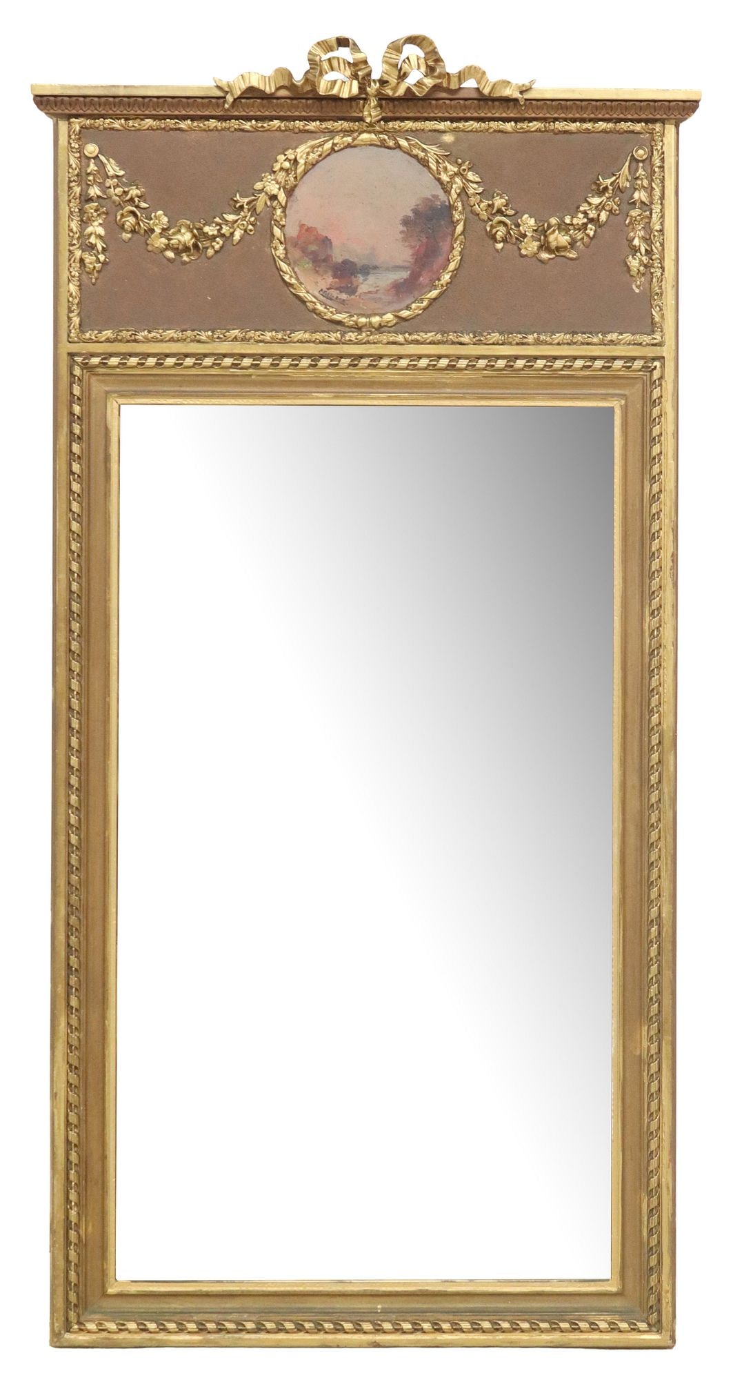FRENCH LOUIS XVI STYLE PARCEL GILT & PAINTED TRUMEAU MIRROR: French Louis XVI style parcel gilt trumeau mirror, early 20th c., having ribbon crest, above central oil on board landscape painting, signed illegibly lower left, flanked by floral swag, above rectang