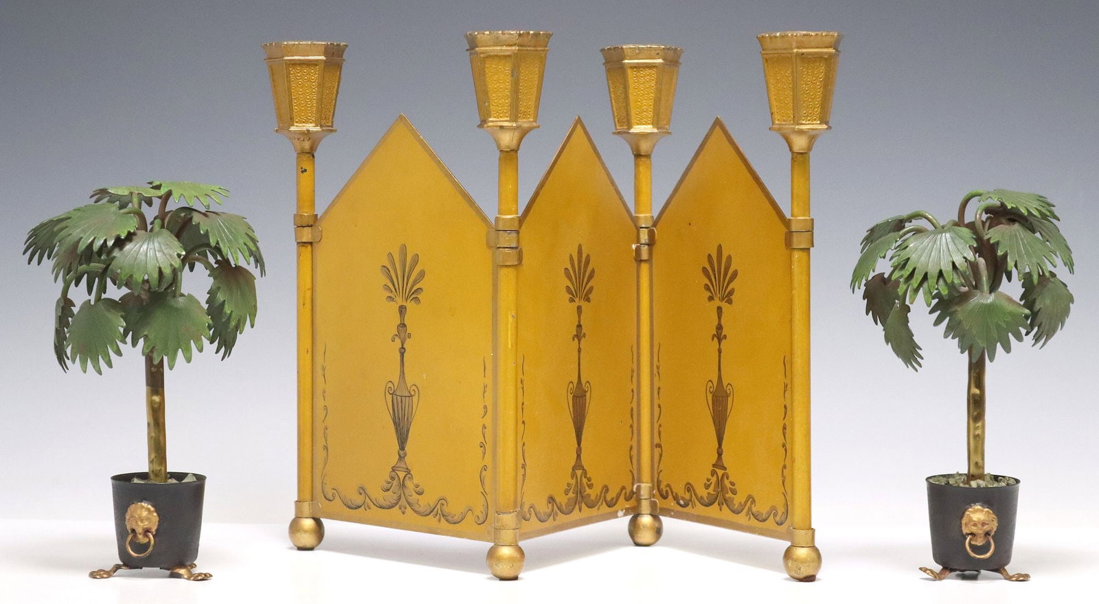 (3) CONTINENTAL TOLE PAINTED TABLE ITEMS: PALM TREES & FOLDING SCREEN CANDELABRA: (lot of 3) Continental tole painted table items, 20thc., including: (2) polychrome painted trees, integral rocks in pot with lion mask handles, rising on paw feet, approx 7 7/8"h, 4.5"w, 4"d, (1) four