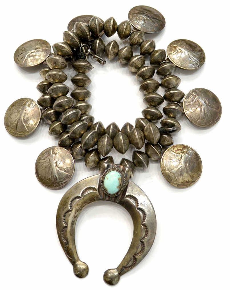 NATIVE AMERICAN SQUASH BLOSSOM COIN NECKLACE 1940S: Scarce Old Pawn Native American squash blossom necklace, (58) beads fashioned from mercury dimes (late1930's/40's) hung with (8) Walking Liberty half-dollars (1940's), the large crescent form naja inc