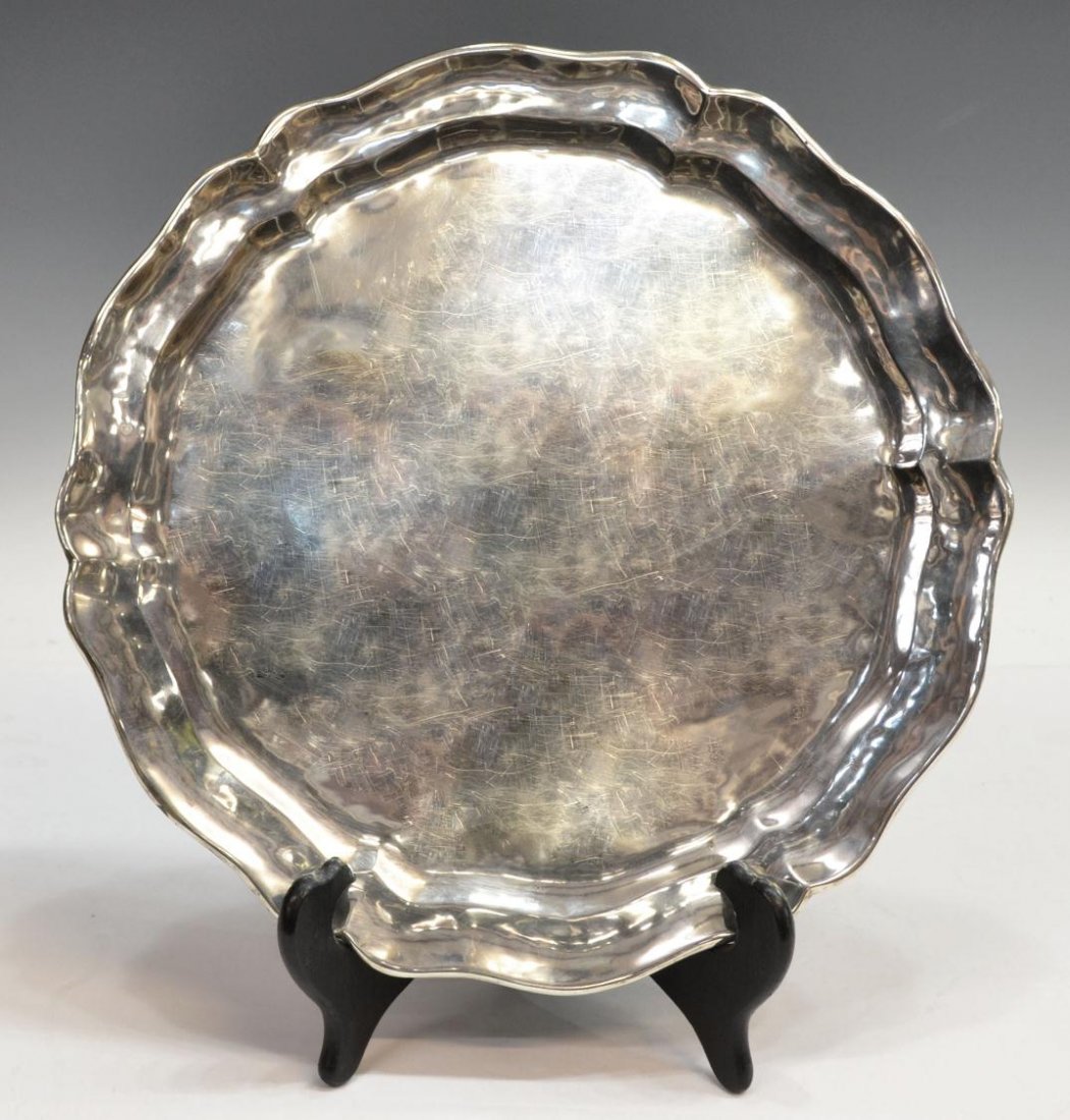 CHILEAN 900 SILVER SALVER, 21.53OZT: South American 900 silver salver, Chile, marks as pictured, overall surface wear, some denting, 13.5"diam, 21.53ozt Start Price: $300.00