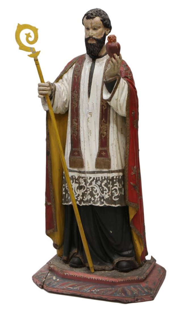 ANTIQUE RELIGIOUS WOOD STATUE, THE SACRED HEART: French Colonial polychrome wood religious statue, c. 1900, a depiction of The Sacred Heart, parcel gilt vestments, glass faces eyes, wear/cracking consistent with age, loss to base at back, 36"h, Star