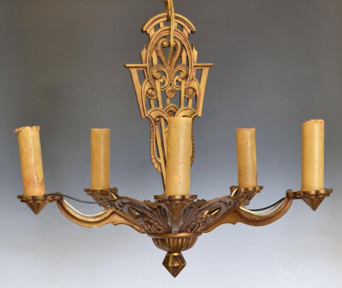 ART DECO LIGHTOLIER AFTER SUNSET CHANDELIER: American Art Deco gilt metal five-light chandelier, by Lightolier, the 'After Sunset', c. 1920's, central standard having a scrolled foliate motif, terminating in a bowl form branching five arms holdi