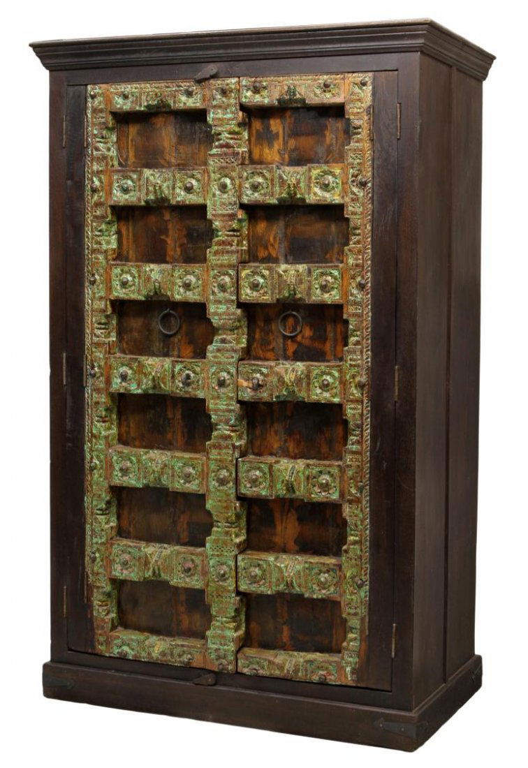 LARGE RUSTIC TELEVISION CABINET: Large Southwest style television cabinet, a stepped cornice over the two double hinged front doors formed to appear as a single antique door with faux bronze oxidized finish, the interior with an uppe