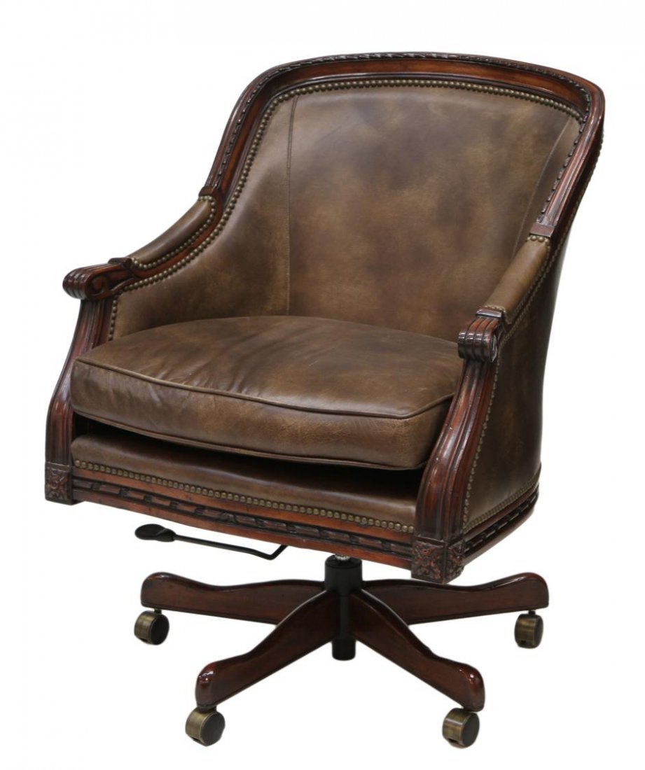 McKINNEY LEATHER BARREL BACK SWIVEL OFFICE CHAIR: Brown leather upholstered barrel back office chair with mahogany finish frame set on swivel, adjustable height base, McKinney Leather of Hickory, Inc. 37.5"h, 30"w, 25"d Start Price: $300.00