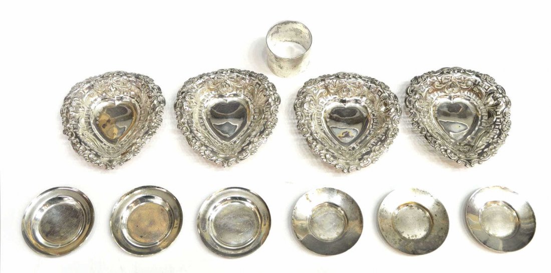(11) STERLING SILVER NUT DISHES & WMF SILVER PLATE: (lot of 11) Sterling and silver plate tableware, comprising: (4) Elkington & Company sterling heart form nut dishes having scrolled and pierced edges, .75"h, 4.25"w, 4.5"d; (1) 800 silver napkin ring,