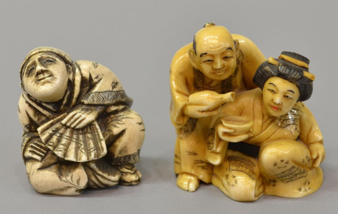 (2) JANPANESE FIGURAL CARVED IVORY NETSUKE GROUP: *International shipping is not available on this lot*(lot of 2) Japanese figural carved ivory netsuke, 20th c.: (1) entertainer seated with fan, signed æGyokuseiÆ 1.5"h, 1.25"w; (1) a townsman pouri
