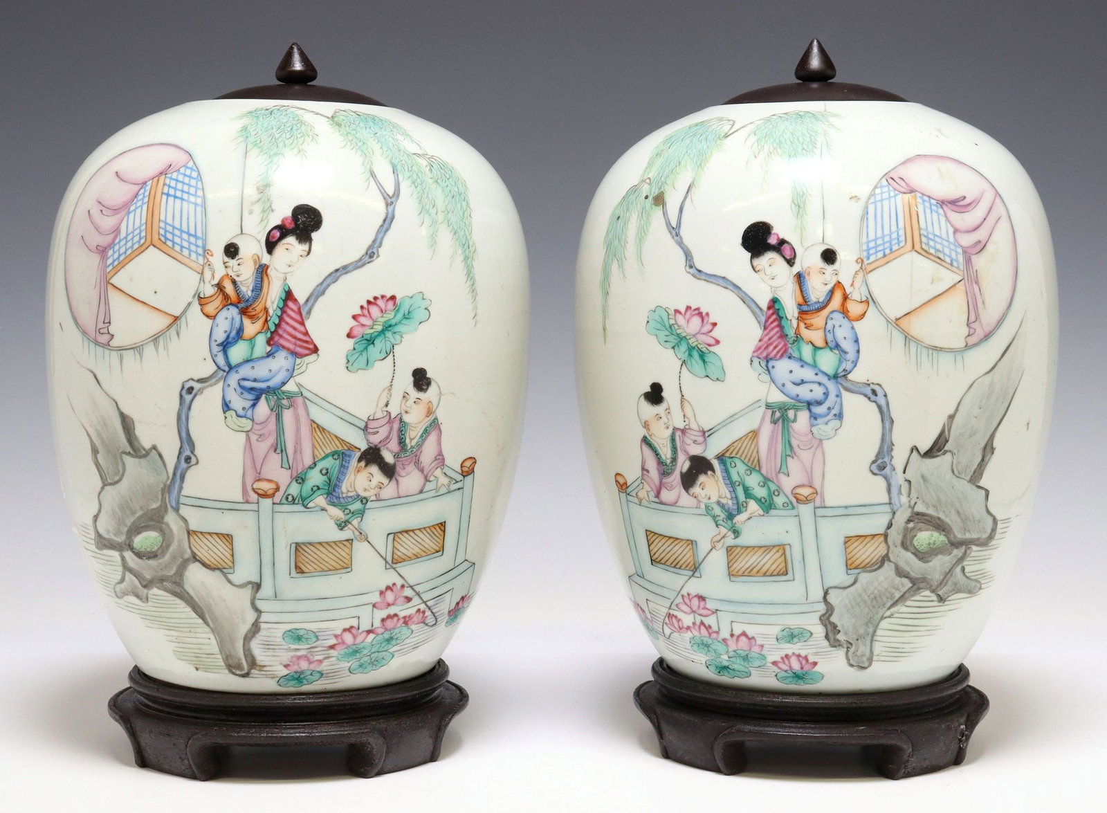 (2) CHINESE FAMILLE ROSE PORCELAIN LIDDED MELON JARS: (pair) Chinese famille rose porcelain lidded melon jars, having enameled figural scene, with calligraphic script, each on wood stand, vase: approx 10.5"h, 8.75"diam, overall on wood stand: 1