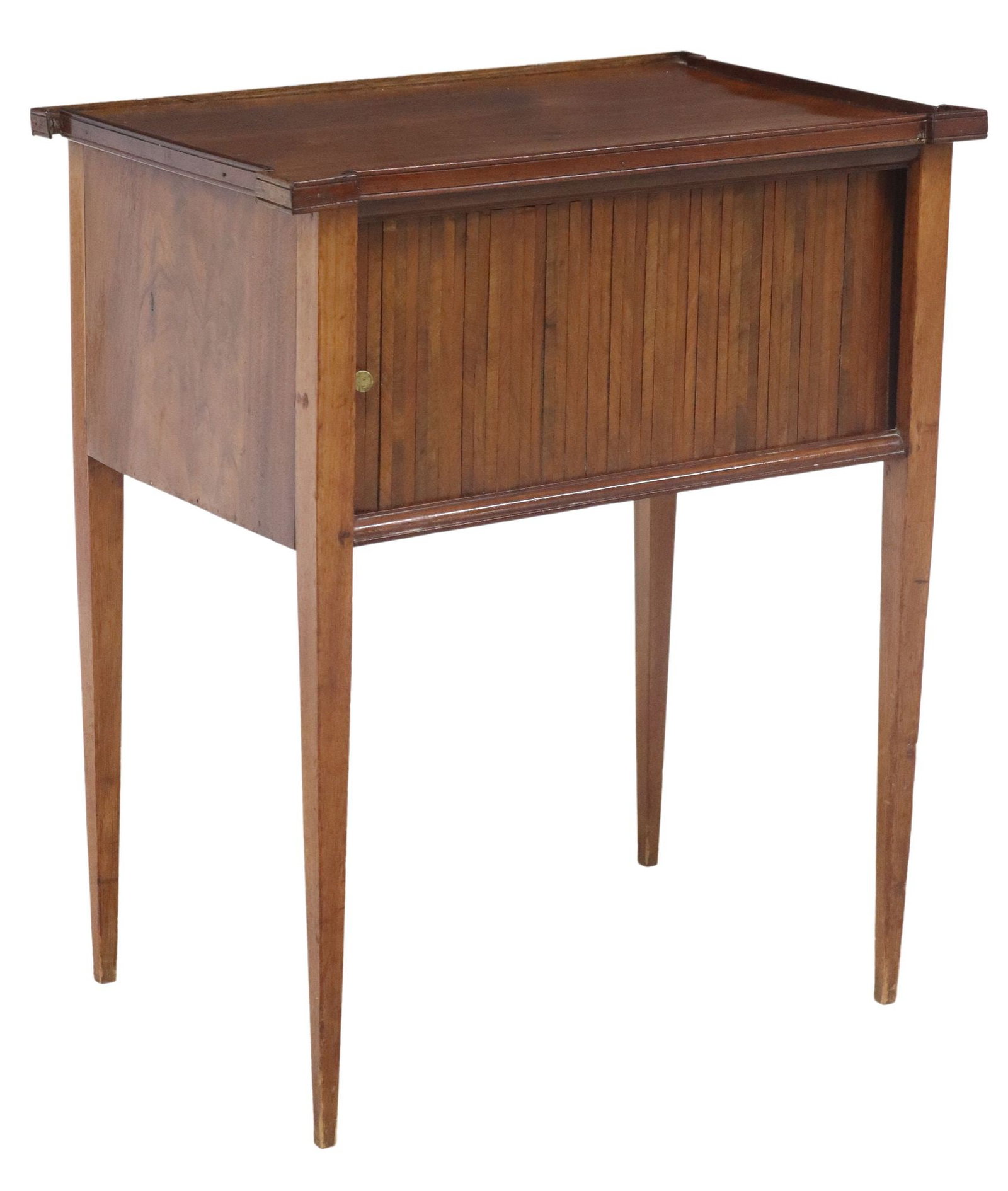 FRENCH MAHOGANY TAMBOUR DOOR BEDSIDE CABINET: French mahogany nightstand, 20th c., having shaped top, over conforming case with tambour cabinet door, revealing open interior, rising on squared and tapered supports, loss to upper trim at back