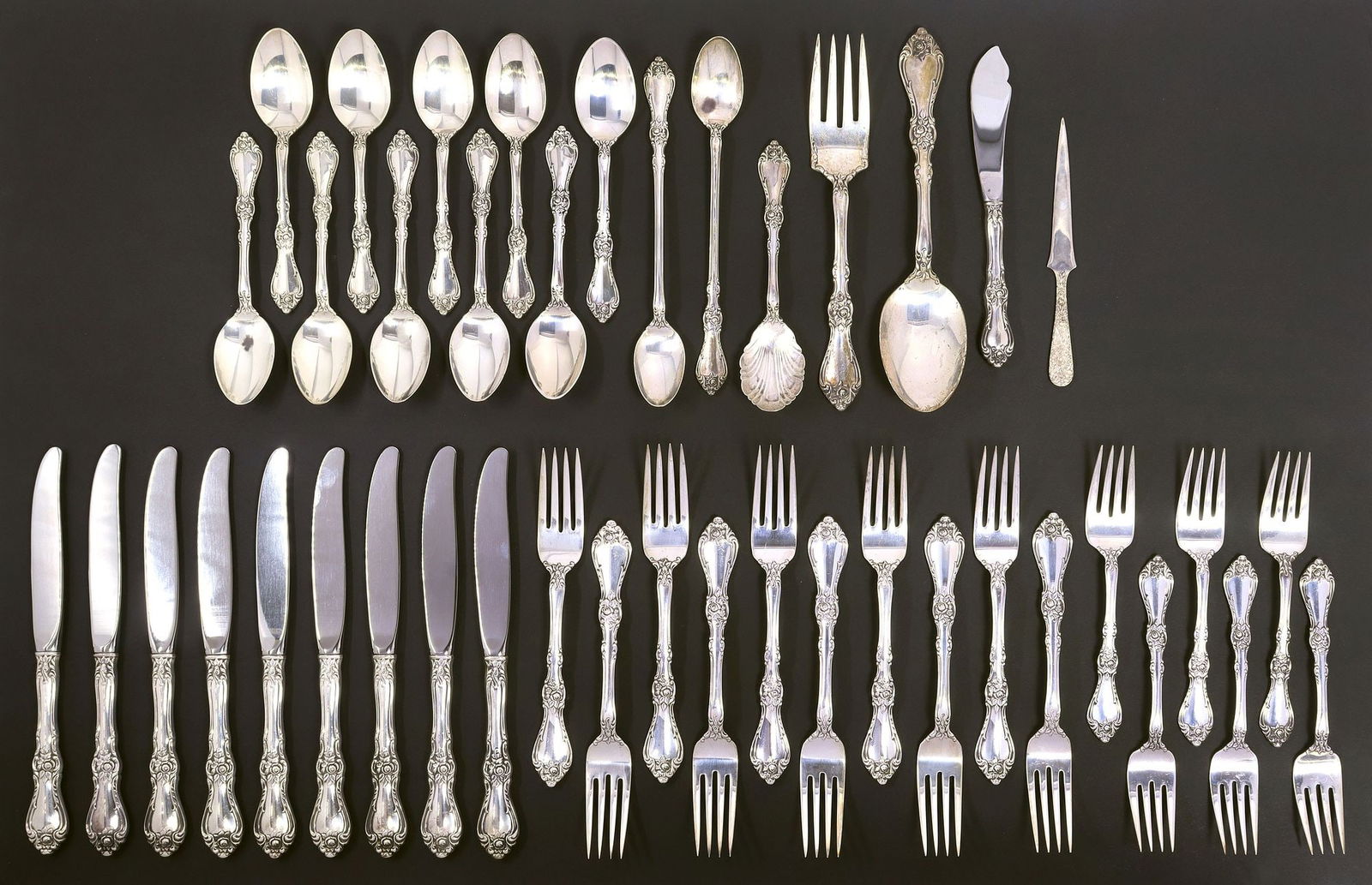 (42) WALLACE 'ROYAL ROSE' STERLING SILVER FLATWARE SERVICE: (lot of 42) American sterling silver flatware service, Wallace Silversmiths, in the "Royal Rose" pattern, including: (9) hollow handle knives, 9"l, (10) forks, 7 3/8"l, (6) salad f