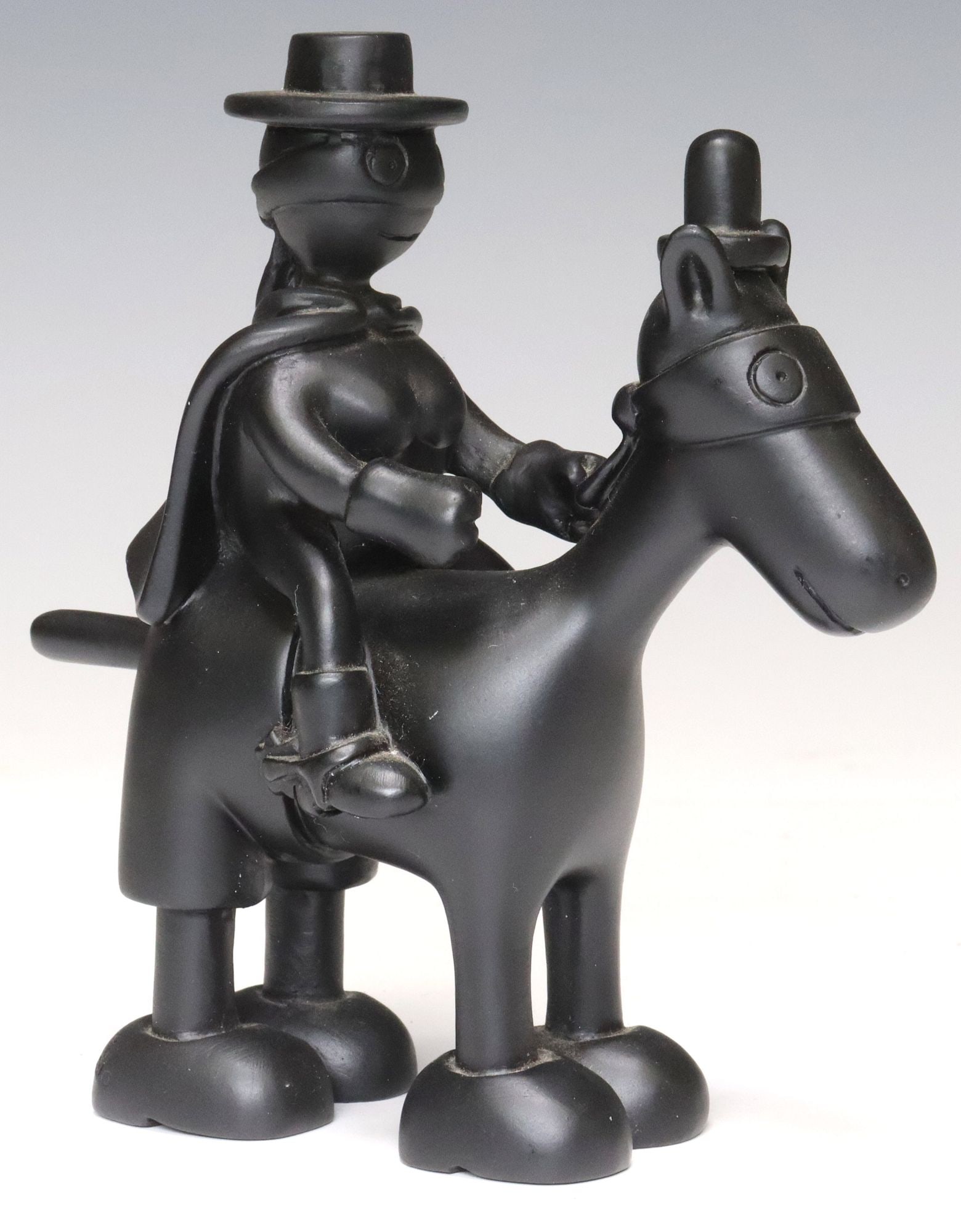 TOM OTTERNESS (B.1952) BLACK RESIN MAQUETTE SCULPTURE, 'HORSE & RIDER': Cast black resin maquette sculpture, "Horse and Rider," signed in cast Tom Otterness (New York, Kansas, b.1952), dated 2004, retaining branded box, approx 5.5"h, 4 7/8"w, 2.25"