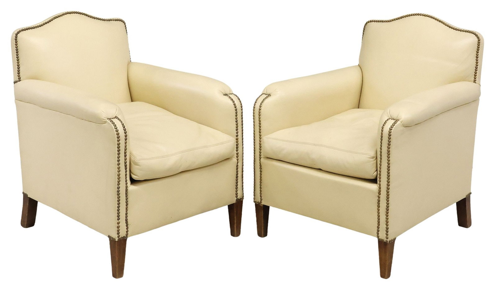 (2) FRENCH LEATHER UPHOLSTERED CLUB CHAIRS: (pair) French leather upholstered club chairs, 20thc., having shaped back, in leather upholstery, with nailhead trim, removable seat cushion, rising on tapered legs, approx 32.75"h, 25.25"w, 29"d, sea