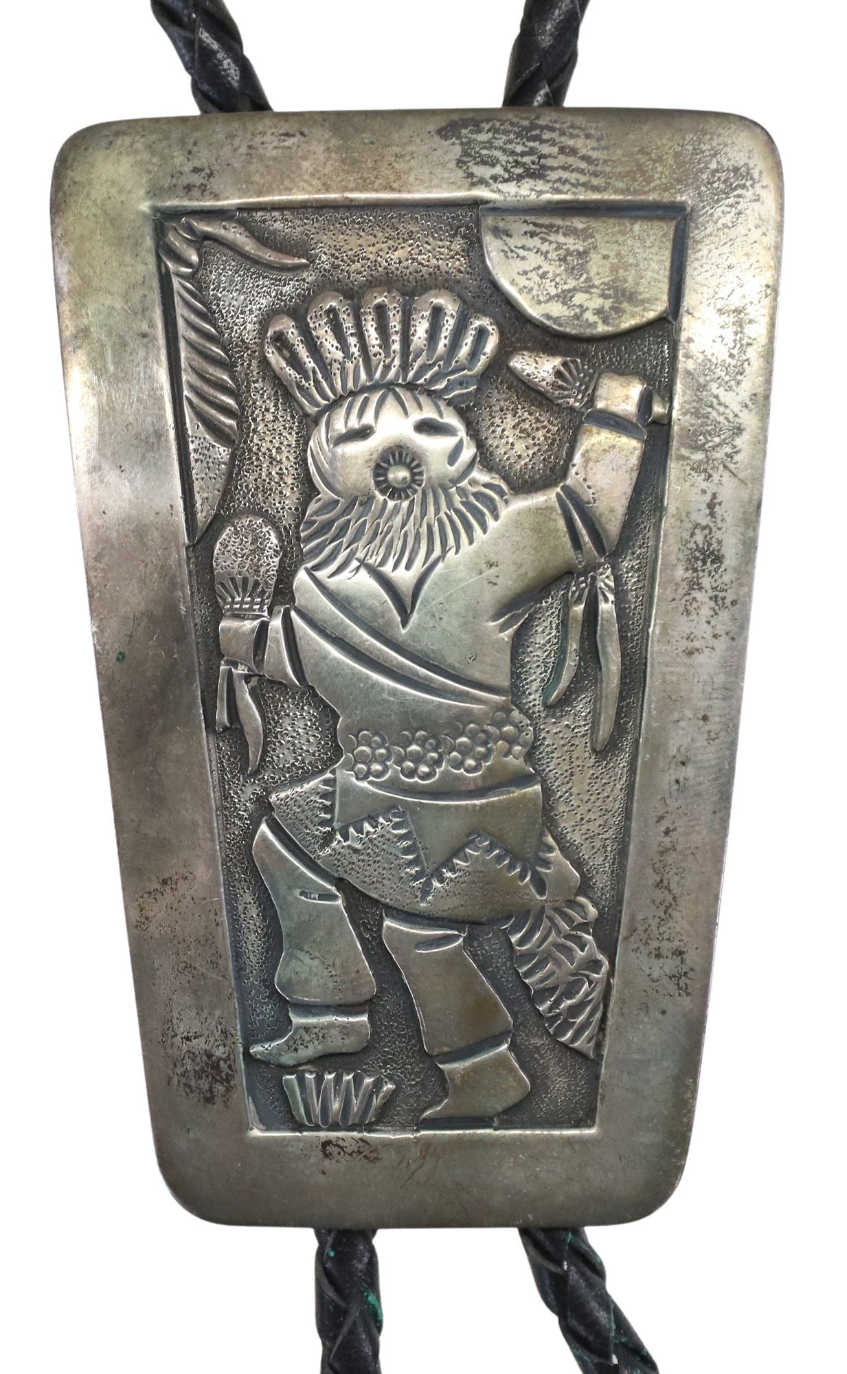 ROBERT BECENTI JR. (1949-2001) SILVER OVERLAY KATSINA DANCER BOLO TIE: Native American sterling silver bolo tie, Robert Becenti Jr. (Navajo/ Dine, 1949-2001), silver overlay plaque with katsina dancer, silver bolo tips, braided black leather cord, ornament stamped&n