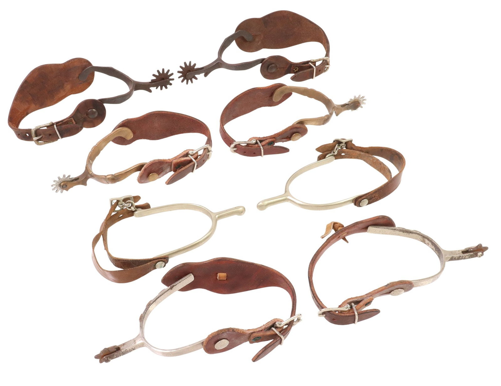 (4 PR) WESTERN COWBOY SPURS: (4 pair) Cowboy Spurs: (1) marked "U.S." over AL, numerals on the shanks, leathers; (1) pair with applied copper, 5 point star 1" rowels, the leathers with a brass heart; (1) 