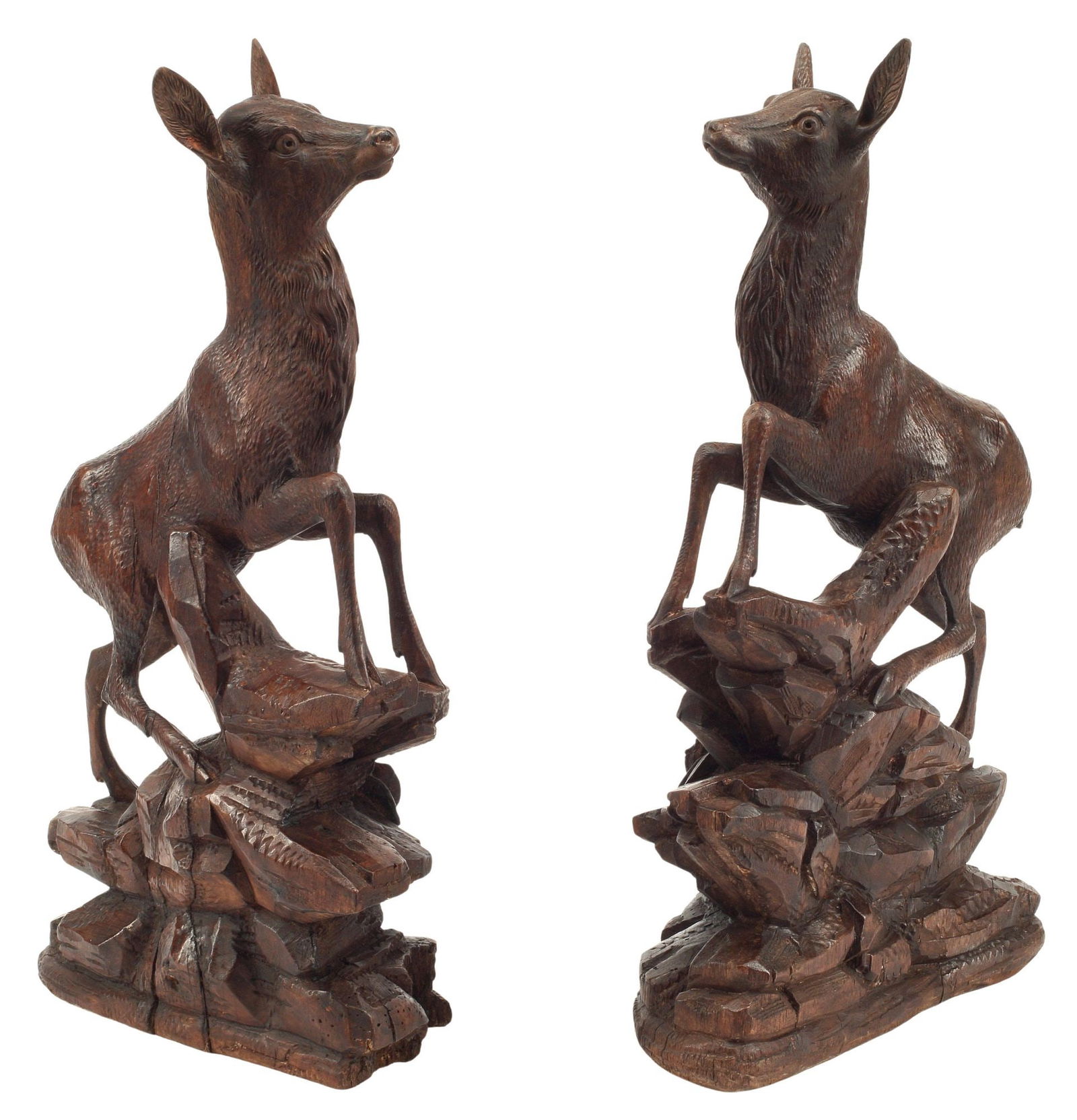 (2) BLACK FOREST STYLE CARVED WOOD SCULPTURES, DEER ON ROCKY OUTCROP: (pair) Black Forest style carved wood deer sculptures, each standing on naturalistic rocky platform, approx 18"h, 10"w, 5"d, 8.5lbs total