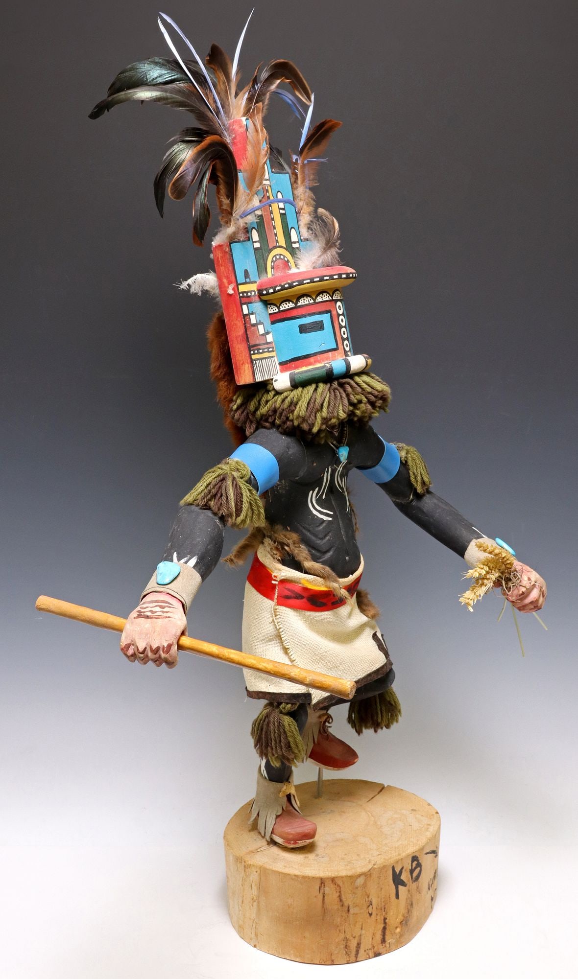 LARGE NATIVE AMERICAN POLYCHROME PAINTED HOPI HEMIS KACHINA DOLL, 35"H: Native American Hopi Pueblo Hemis Kachina doll, initialed KB with other illegible writing, wearing beaded necklace with turquoise stones, with applied feathers and yarn, approx 35"h,20.5 &qu