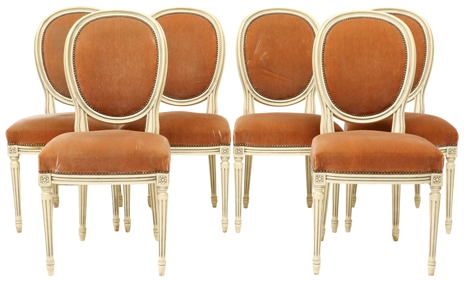 (6) FRENCH LOUIS XVI STYLE WHITE PAINTED DINING CHAIRS: (lot of 6) French Louis XVI style white painted side chairs, early 20th c., each having oval medallion back and padded seat in pink fabric upholstery, with nailhead trim, rising on fluted tapered legs