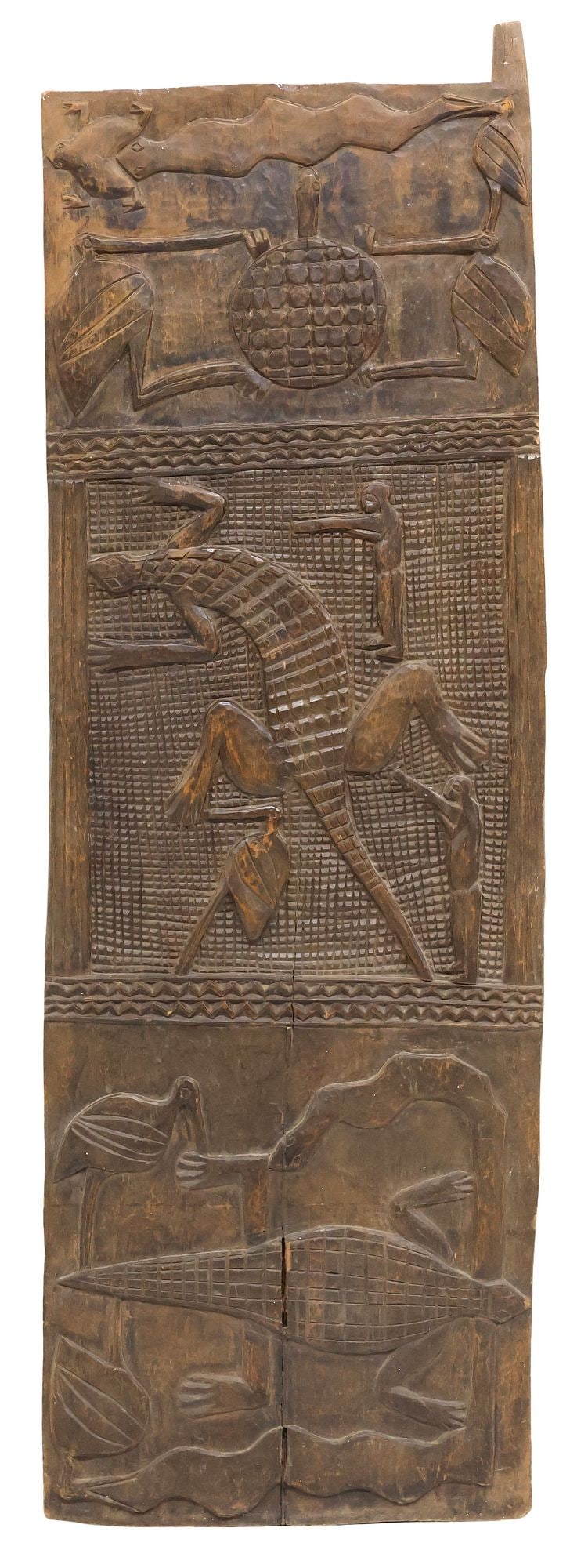 AFRICAN CARVED HARDWOOD ZOOMORPHIC ARCHITECTURAL GRANARY DOOR, 60.5"H: African tribal architectural carved hardwood architectural element, likely a granary door, possibly Dogon Peoples, Mali, rectangular panel with stylized carvings of indigenous animals and a pair of fi