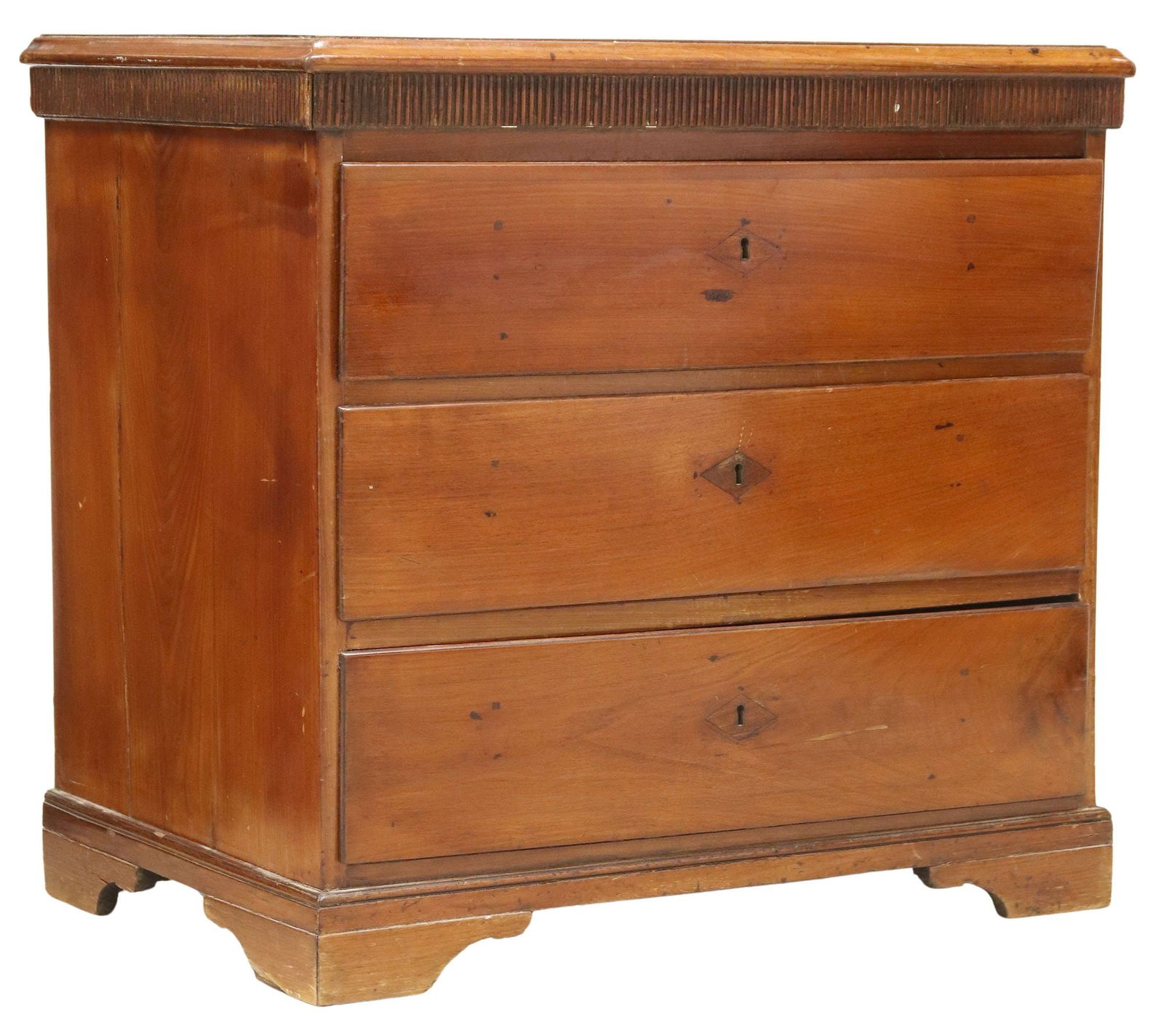 CONTINENTAL THREE-DRAWER COMMODE: Continental commode, late 19th c., frieze with ribbed molding, three drawers, on bracket feet, approx 29.5"h, 31"w, 20.75"d