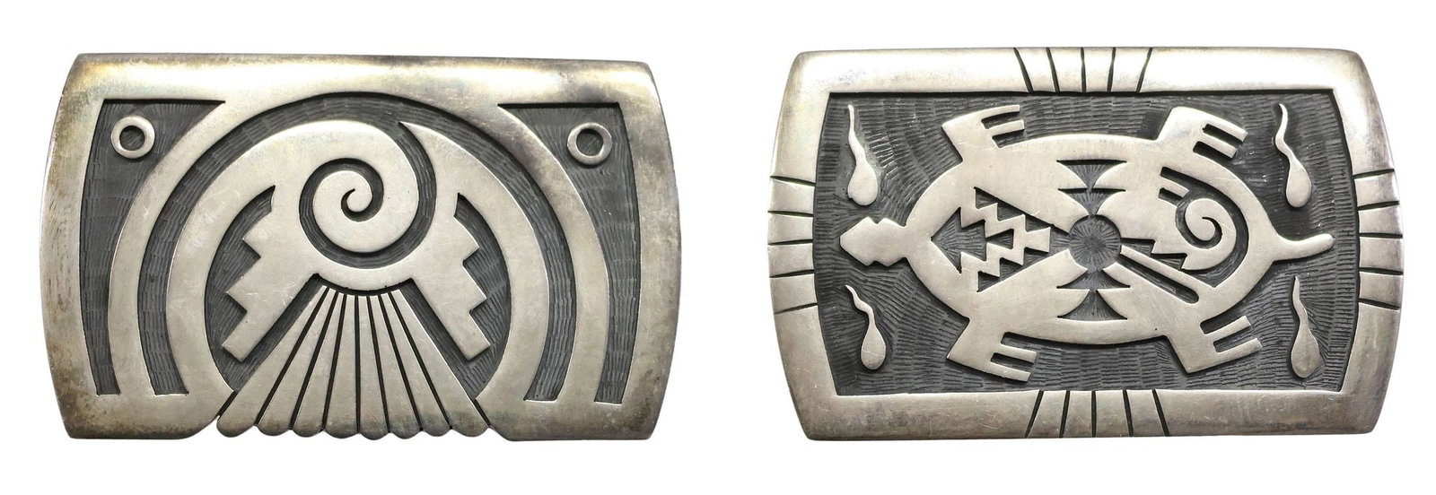 (2) MARK TAWAHONGVA (B.1948) HOPI SILVER OVERLAY BELT BUCKLES: (lot of 2) Native American silver (content unknown) overlay belt buckles of rectangular form with rounded ends, including: (1) Mark Tawahongva (Hopi, b.1948), the plaque with 