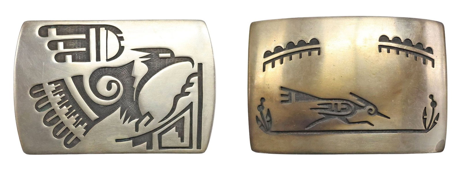 (2) DARREN SEWEYESTEWA (B.1965) HOPI SILVER OVERLAY BELT BUCKLES: (lot of 2) Native American silver overlay belt buckles, Darren Seweyestewa (Hopi, Bear Clan, b.1965), including: (1) detailed with eagle and traditional symbols, initialed DS, marked sterlin