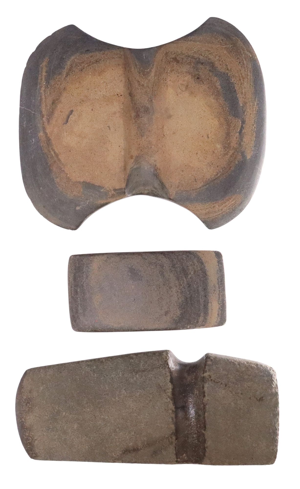 (3) THREE-QUARTERS GROOVED STONE AXE HEADS: (lot of 3) Three-quarters grooved stone axe heads, origin and age unknown, largest: approx 7.25"h, 5.75"w, 1.5"d, 7.5lbs total